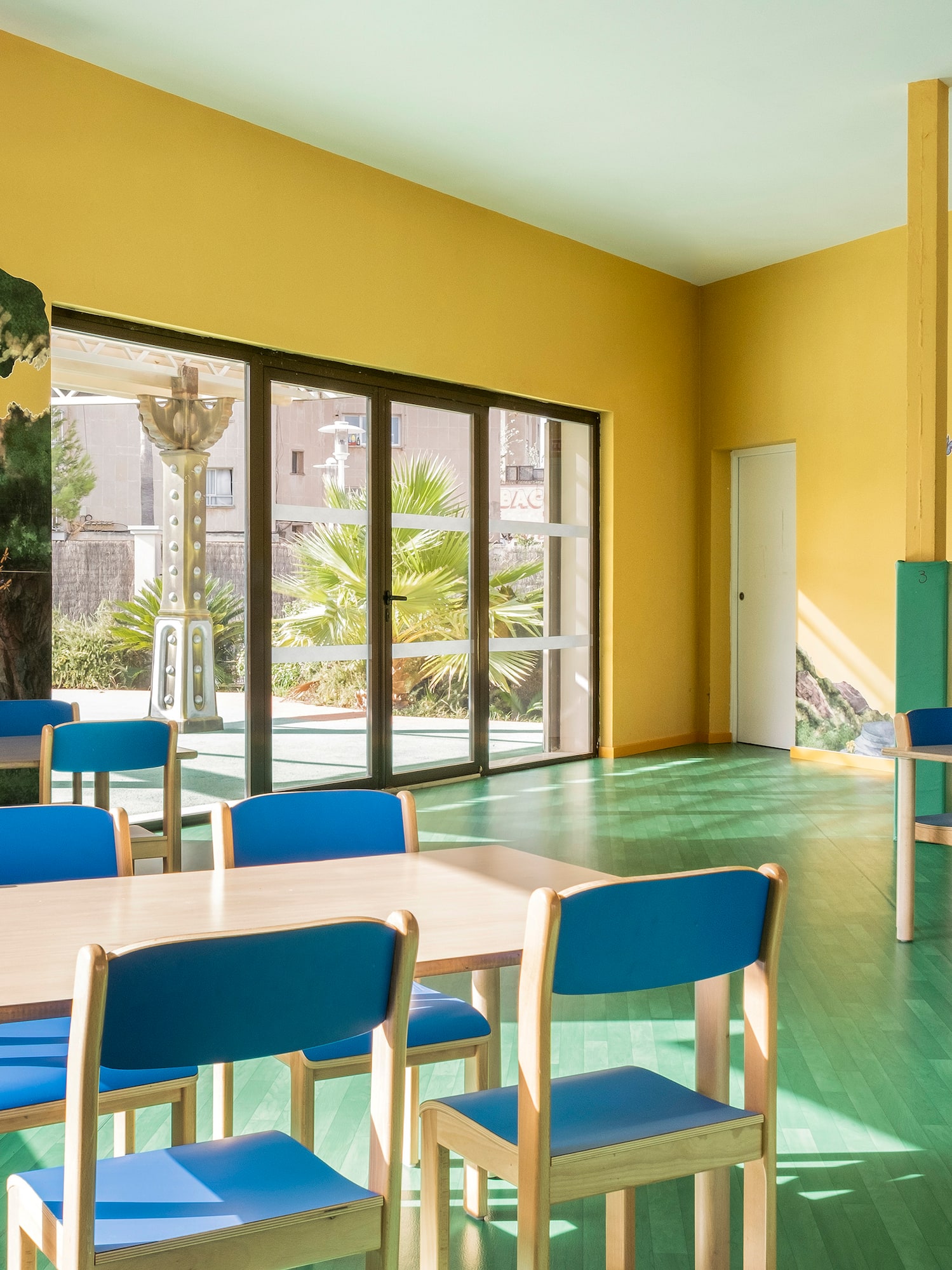 a room with tables and chairs