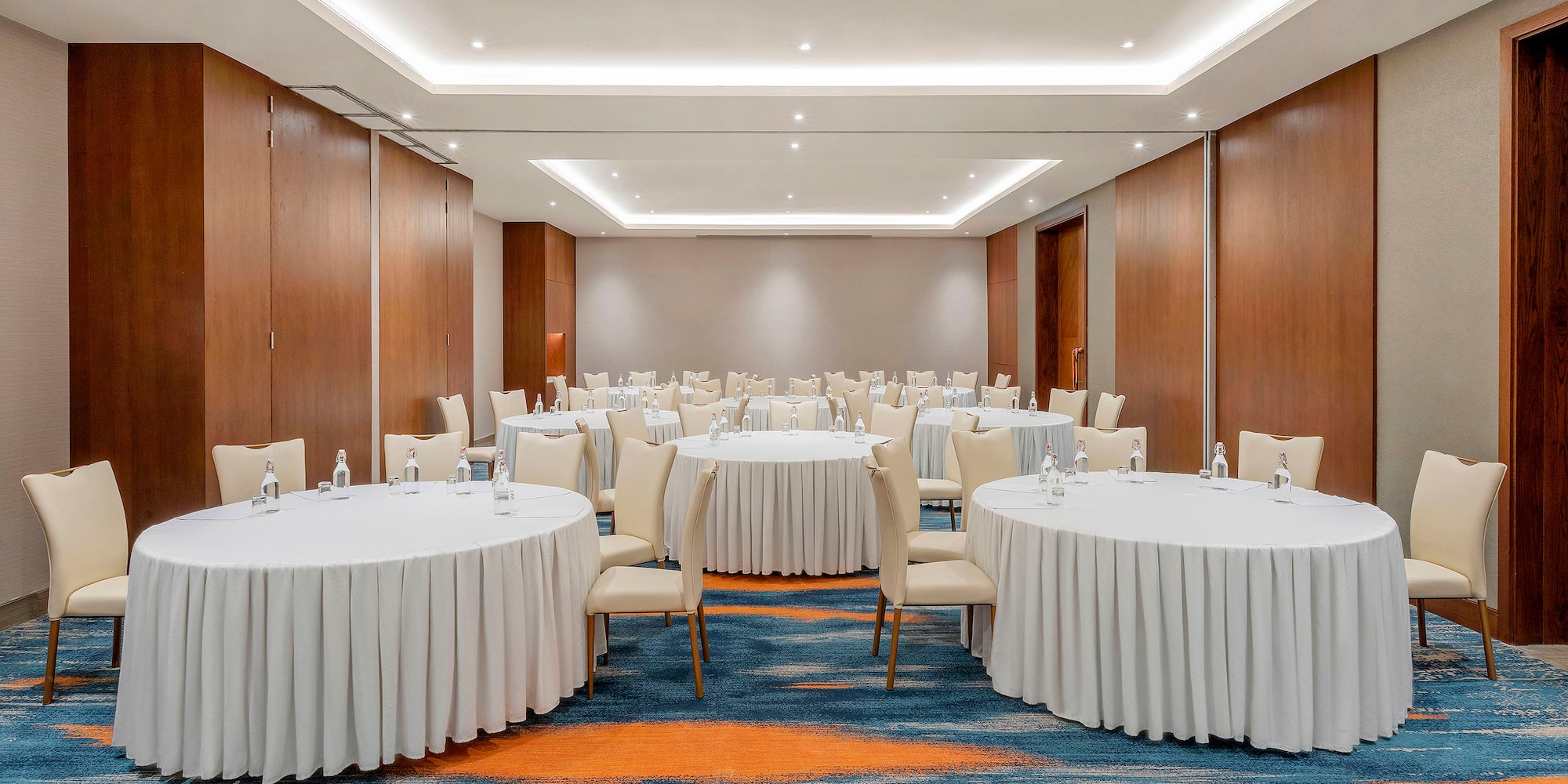 a room with tables and chairs