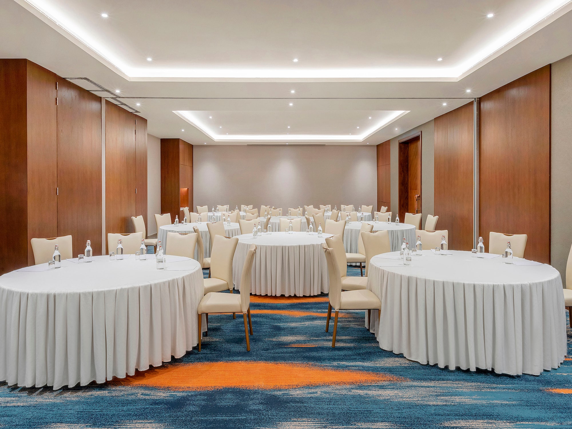 a room with tables and chairs