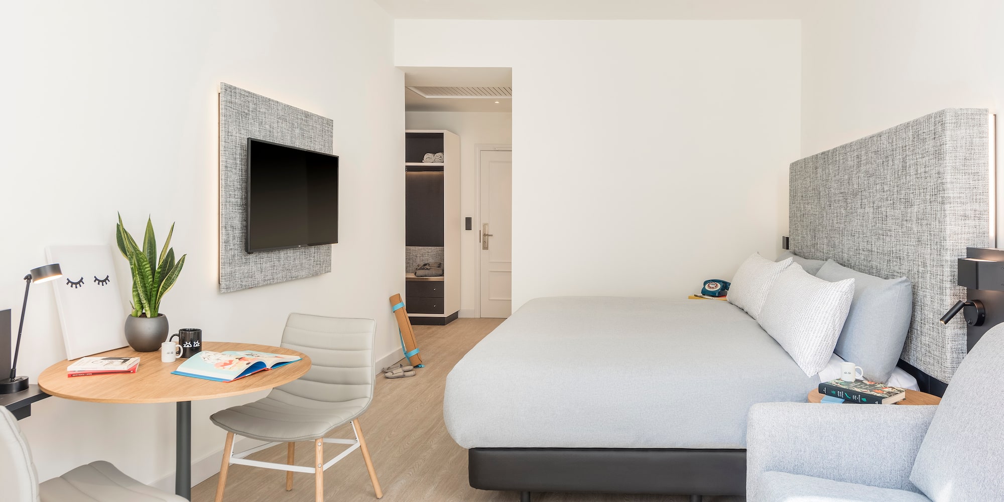 a room with a bed and a table