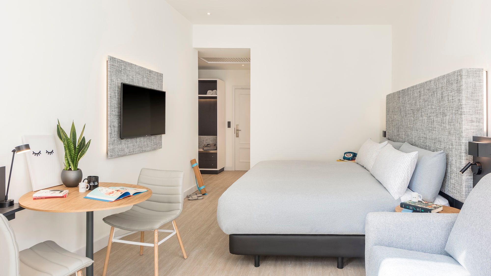 a room with a bed and a table