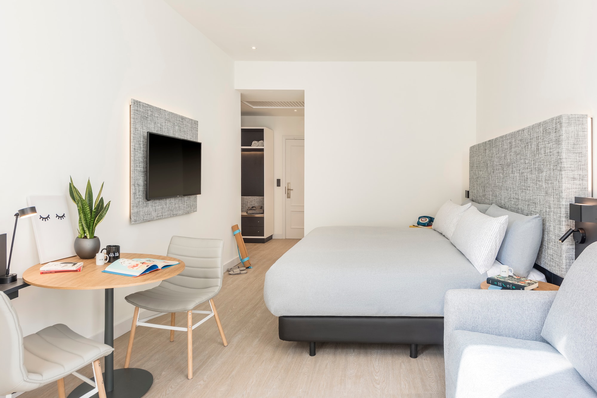 a room with a bed and a table