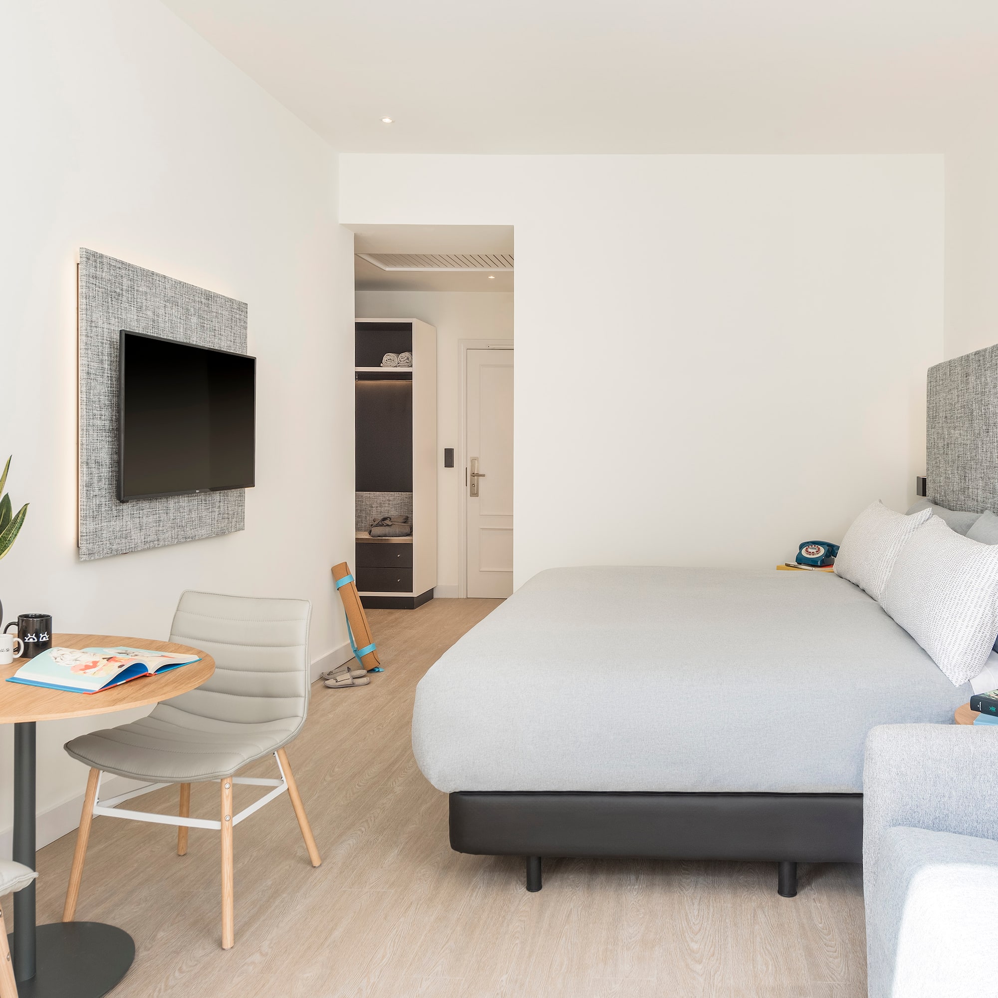 a room with a bed and a table