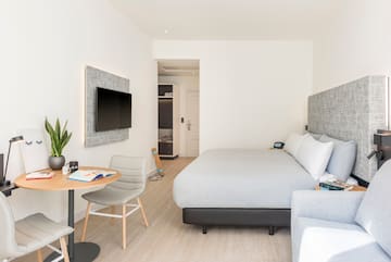 a room with a bed and a table