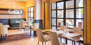 a room with tables and chairs