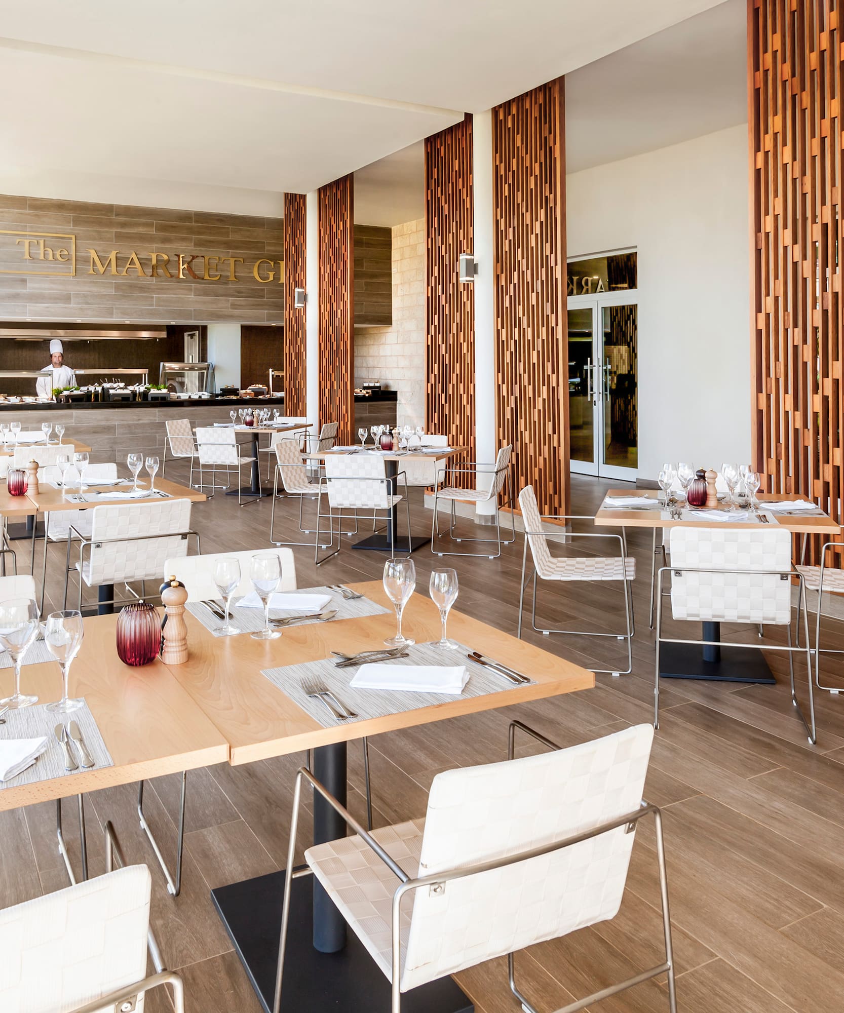 a restaurant with tables and chairs