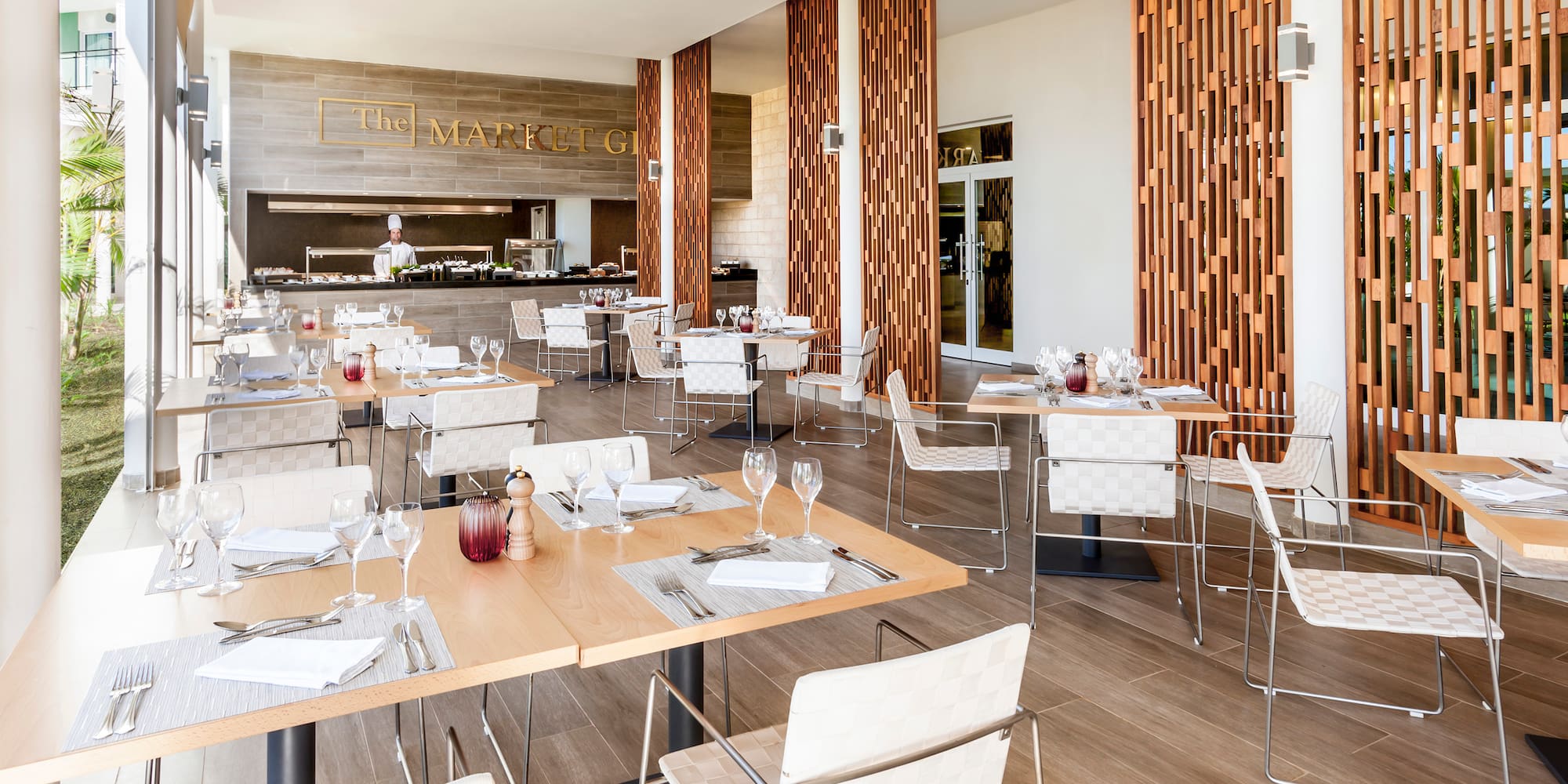 a restaurant with tables and chairs