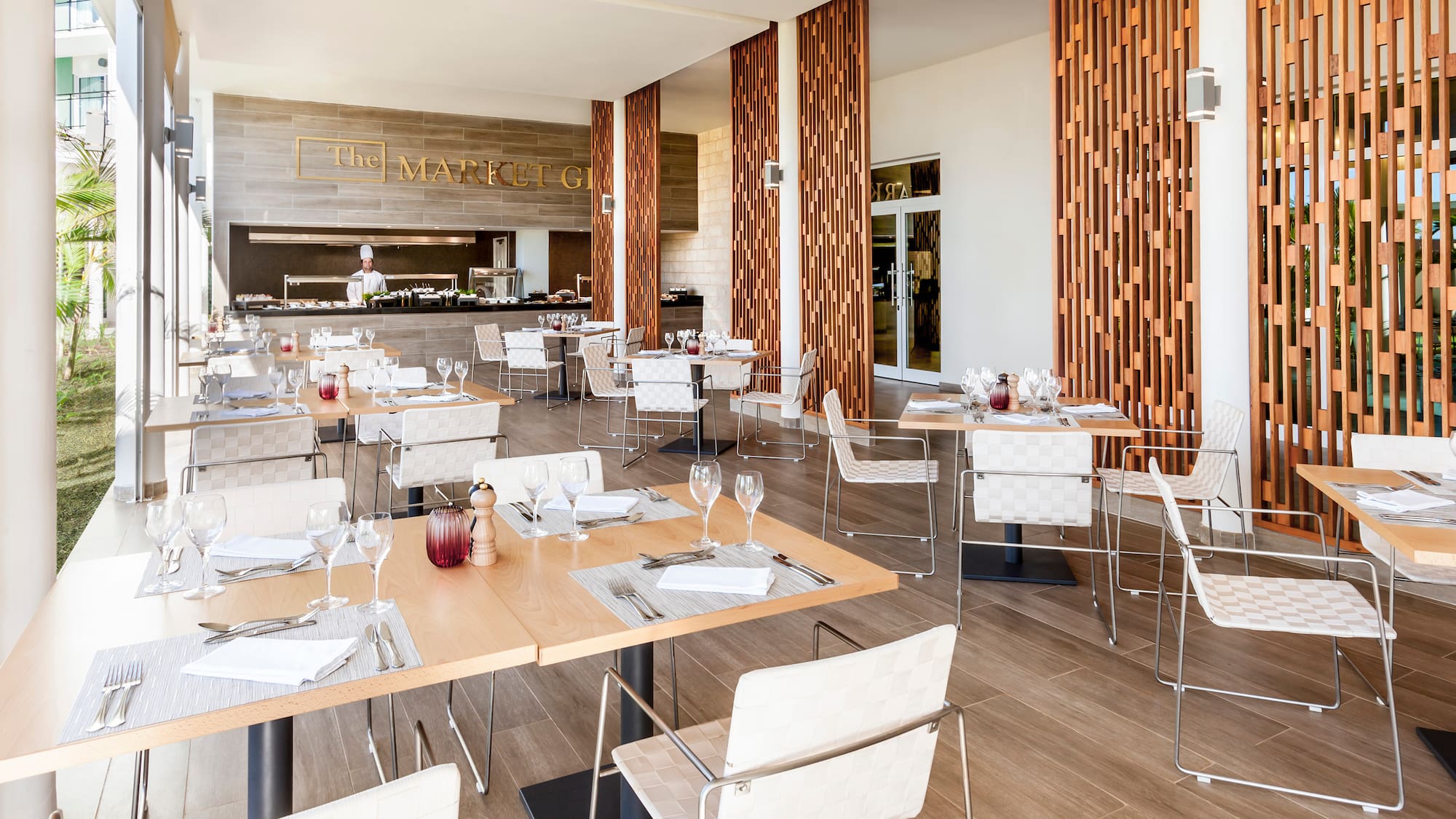 a restaurant with tables and chairs