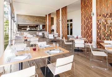 a restaurant with tables and chairs