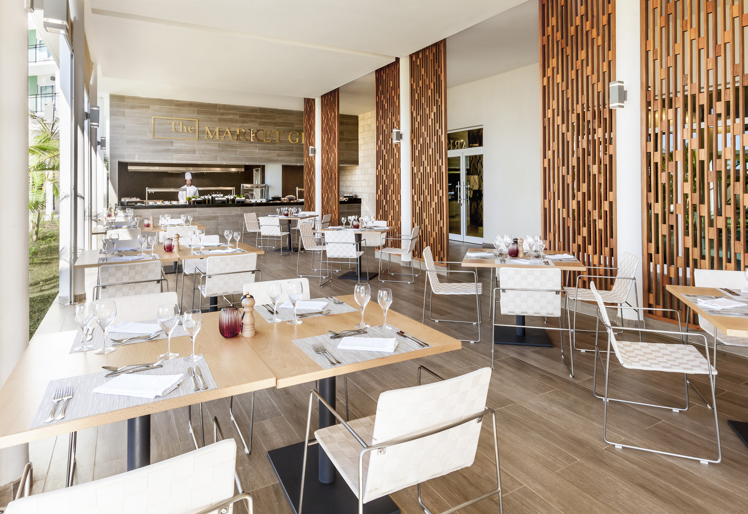 a restaurant with tables and chairs