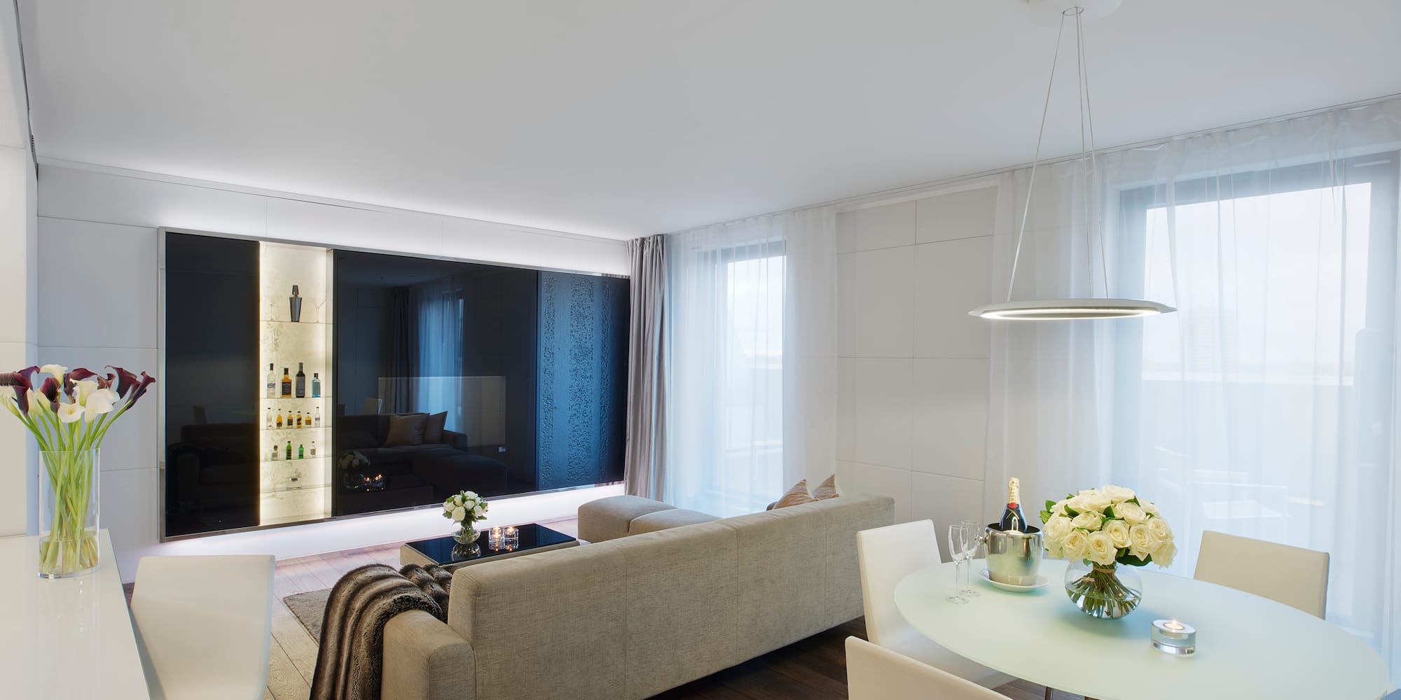 a living room with a couch and a table