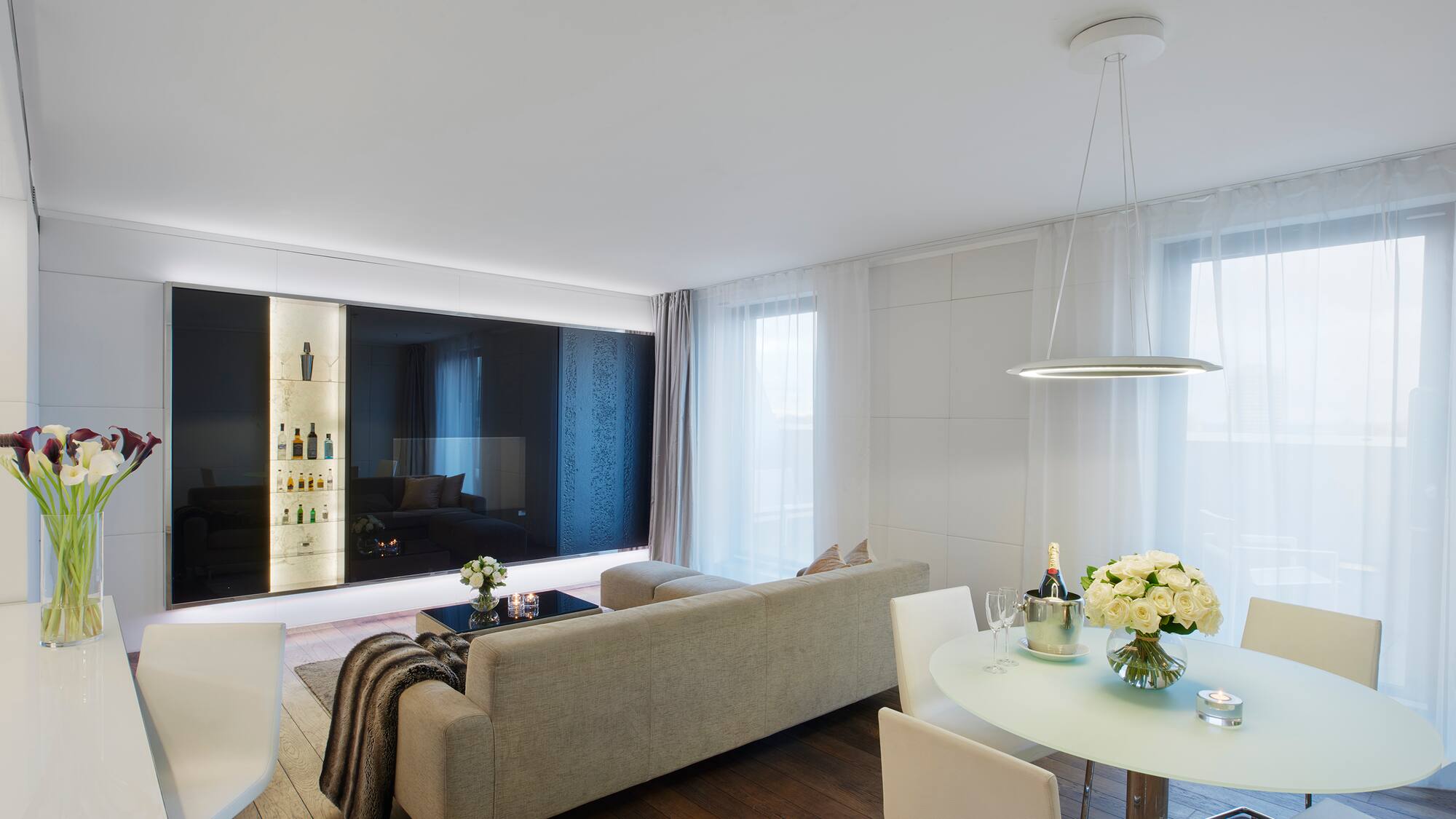 a living room with a couch and a table