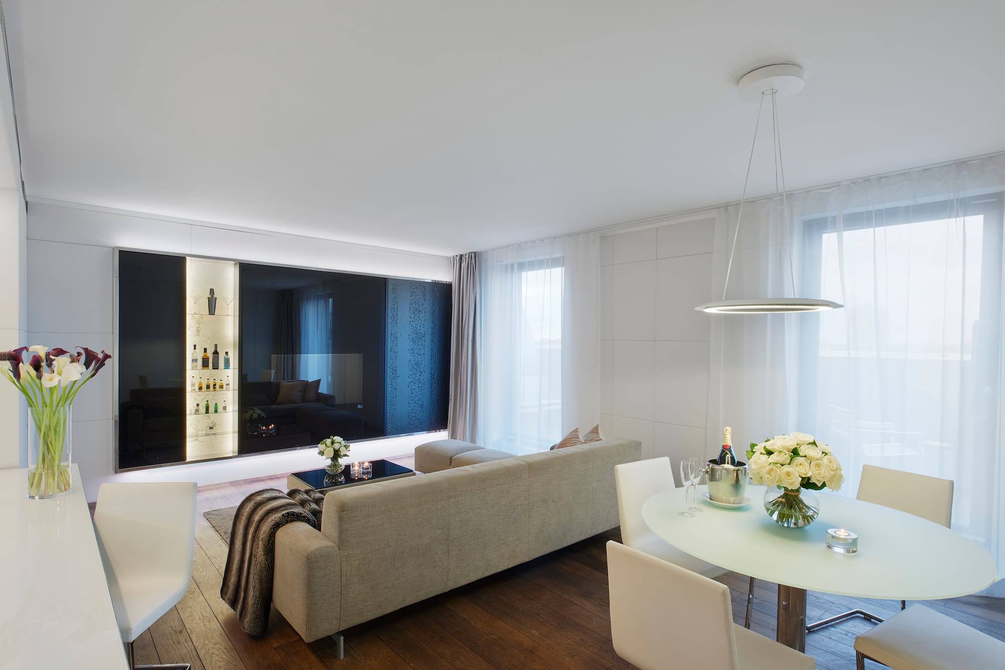 a living room with a couch and a table