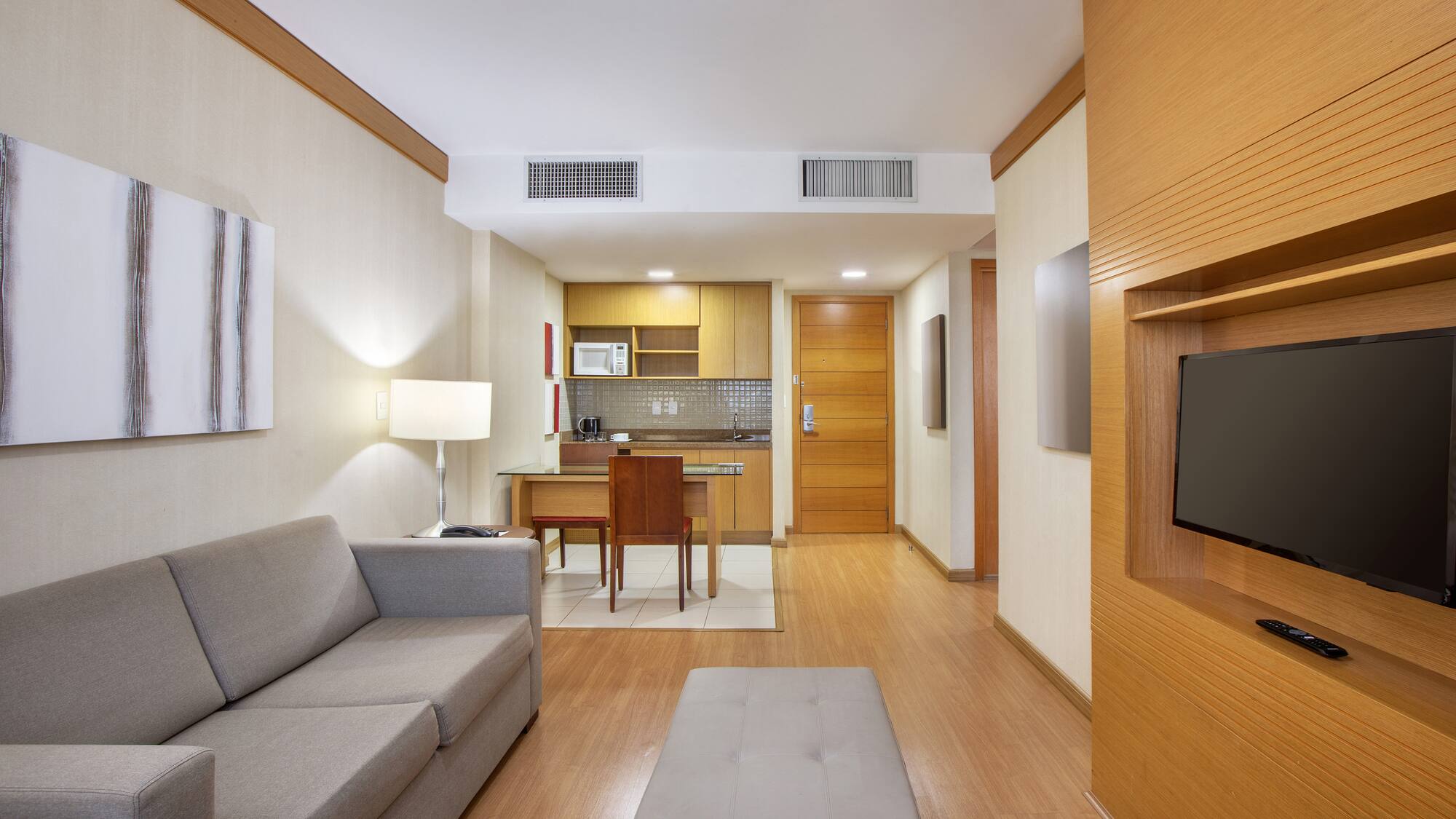 a living room with a couch and a tv