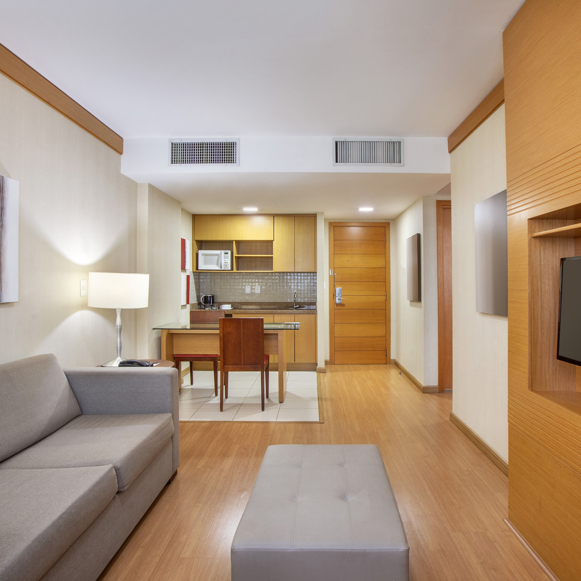 a living room with a couch and a tv