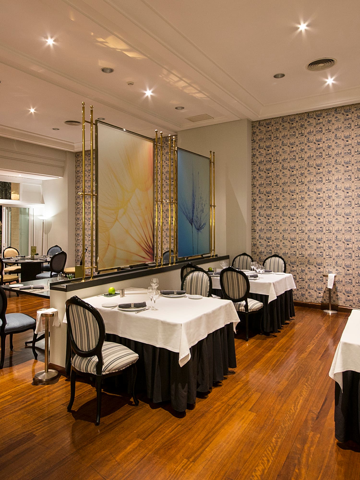 a room with tables and chairs