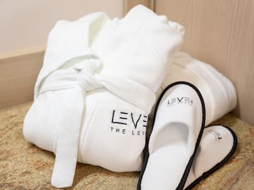 a white robe and slippers