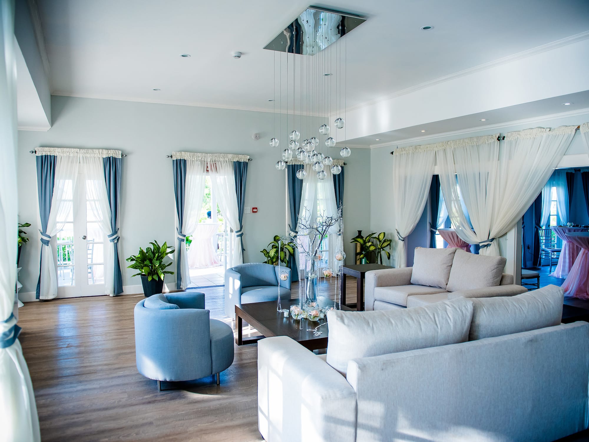 a room with couches and chairs