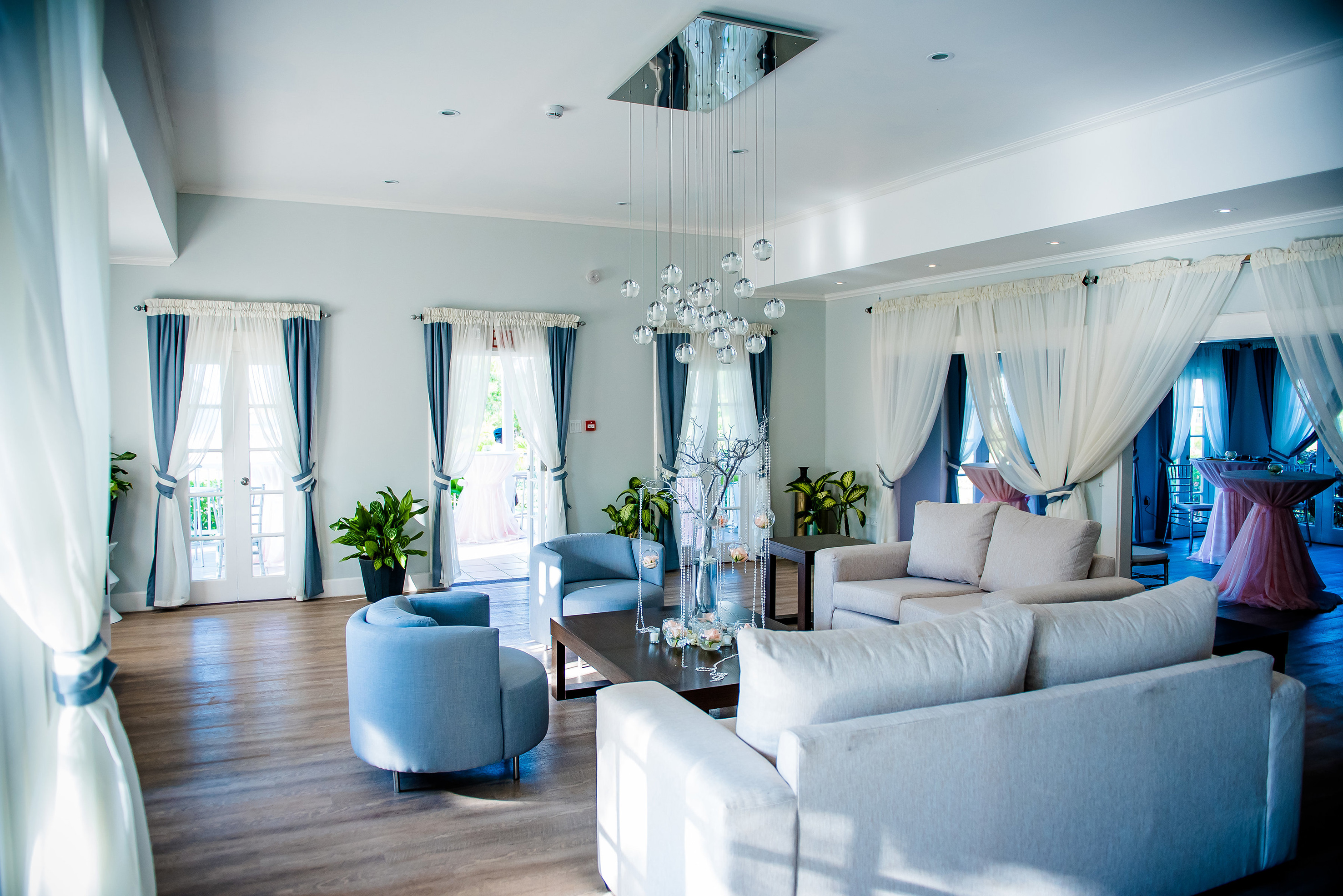 a room with couches and chairs