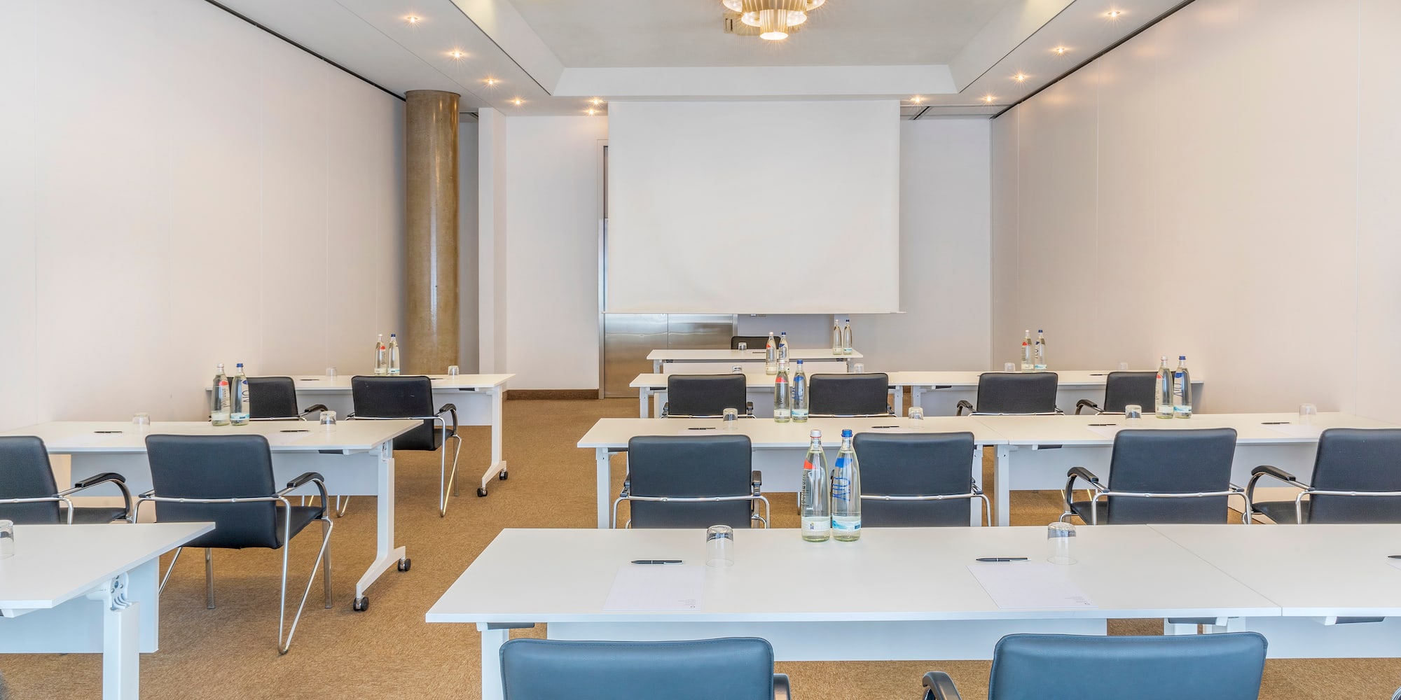 a room with tables and chairs