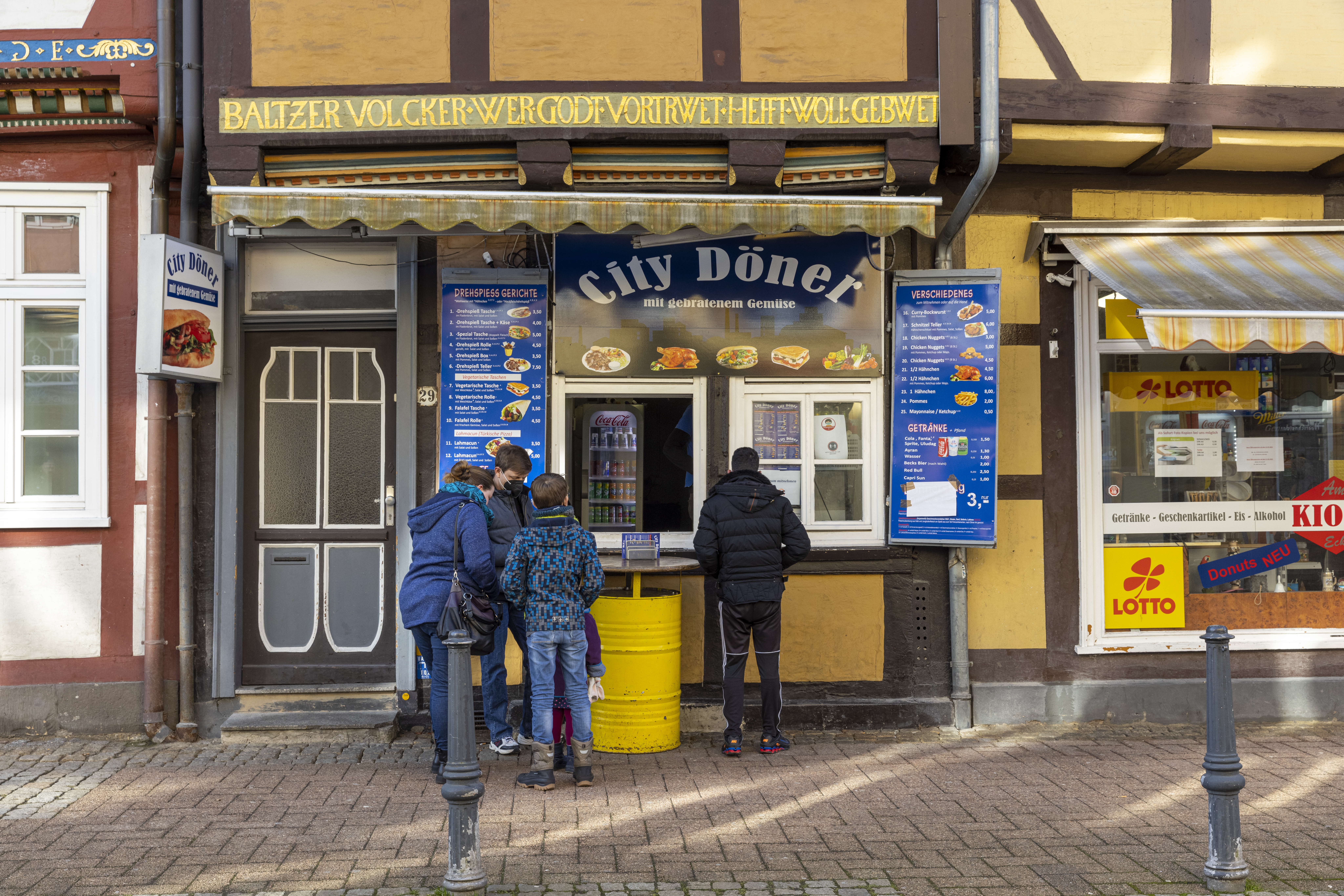 people standing in front of a building