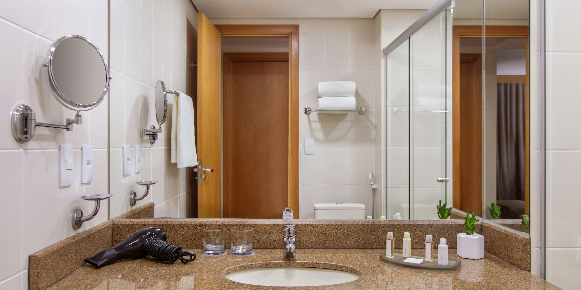 a bathroom with a mirror and a sink