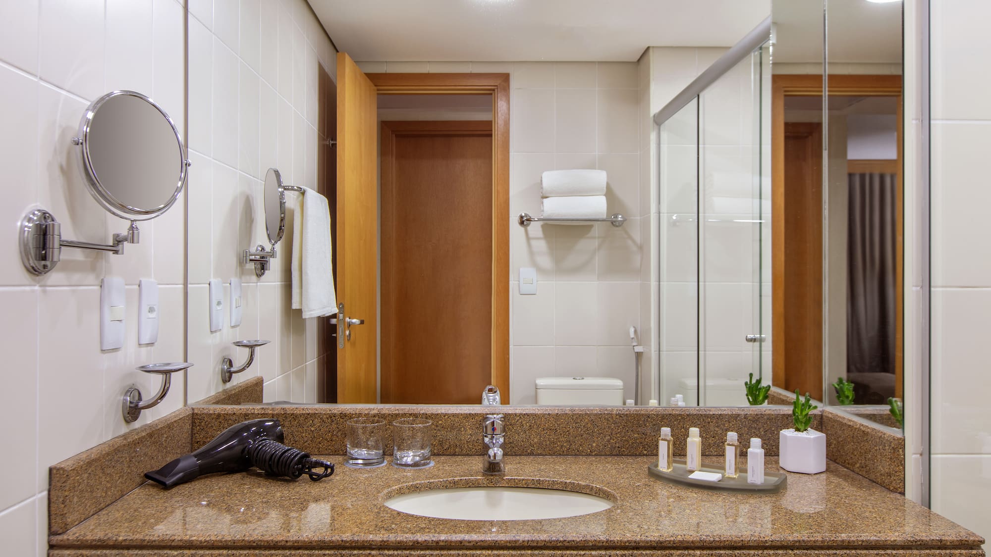 a bathroom with a mirror and a sink