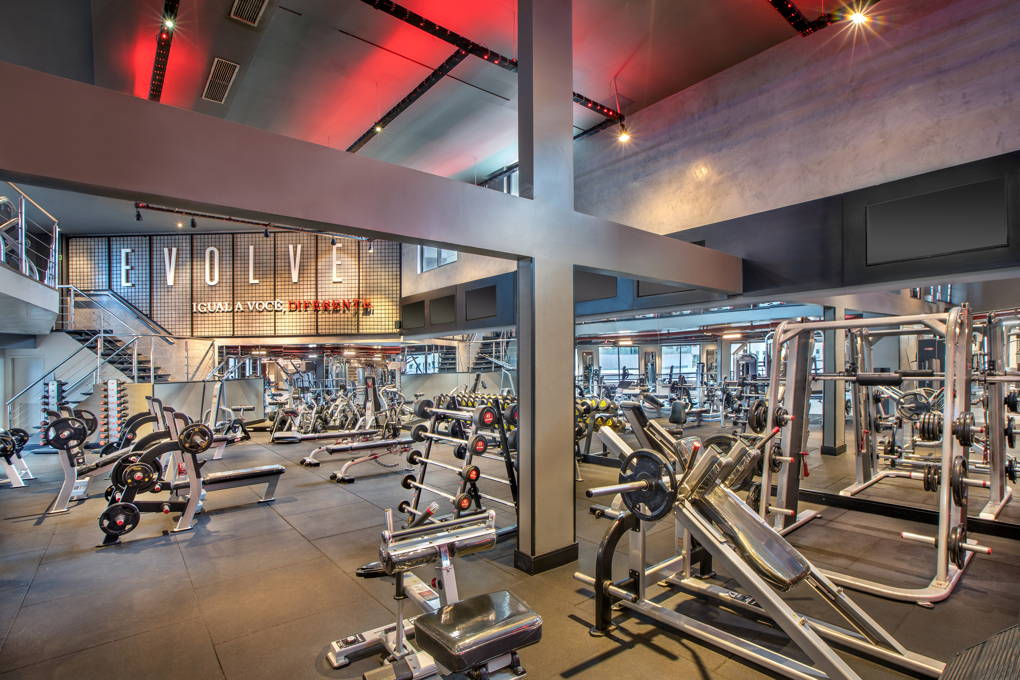 EVOLVE modern gym interior with diverse weight training and fitness equipment. - Evolve Gym - -Hotel Madrid Airport Suites Affiliated by Meliá:, Brasilia