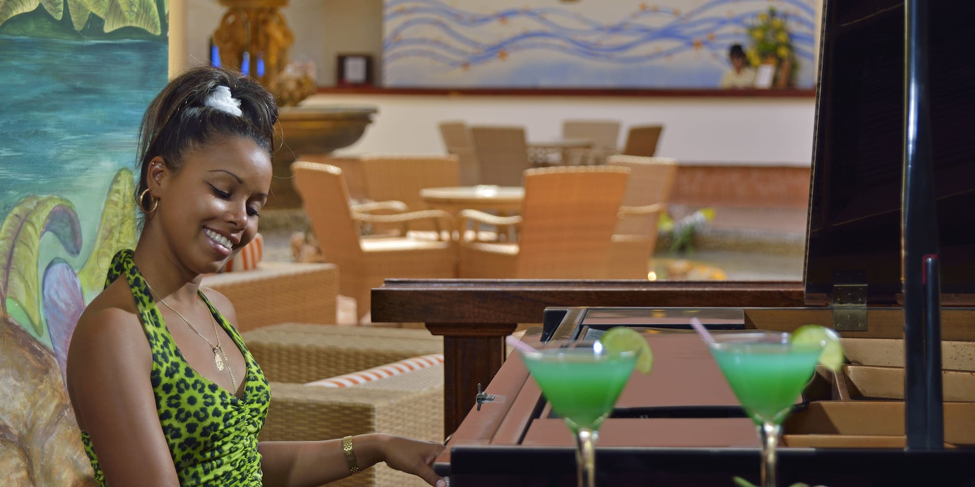 a woman playing a piano