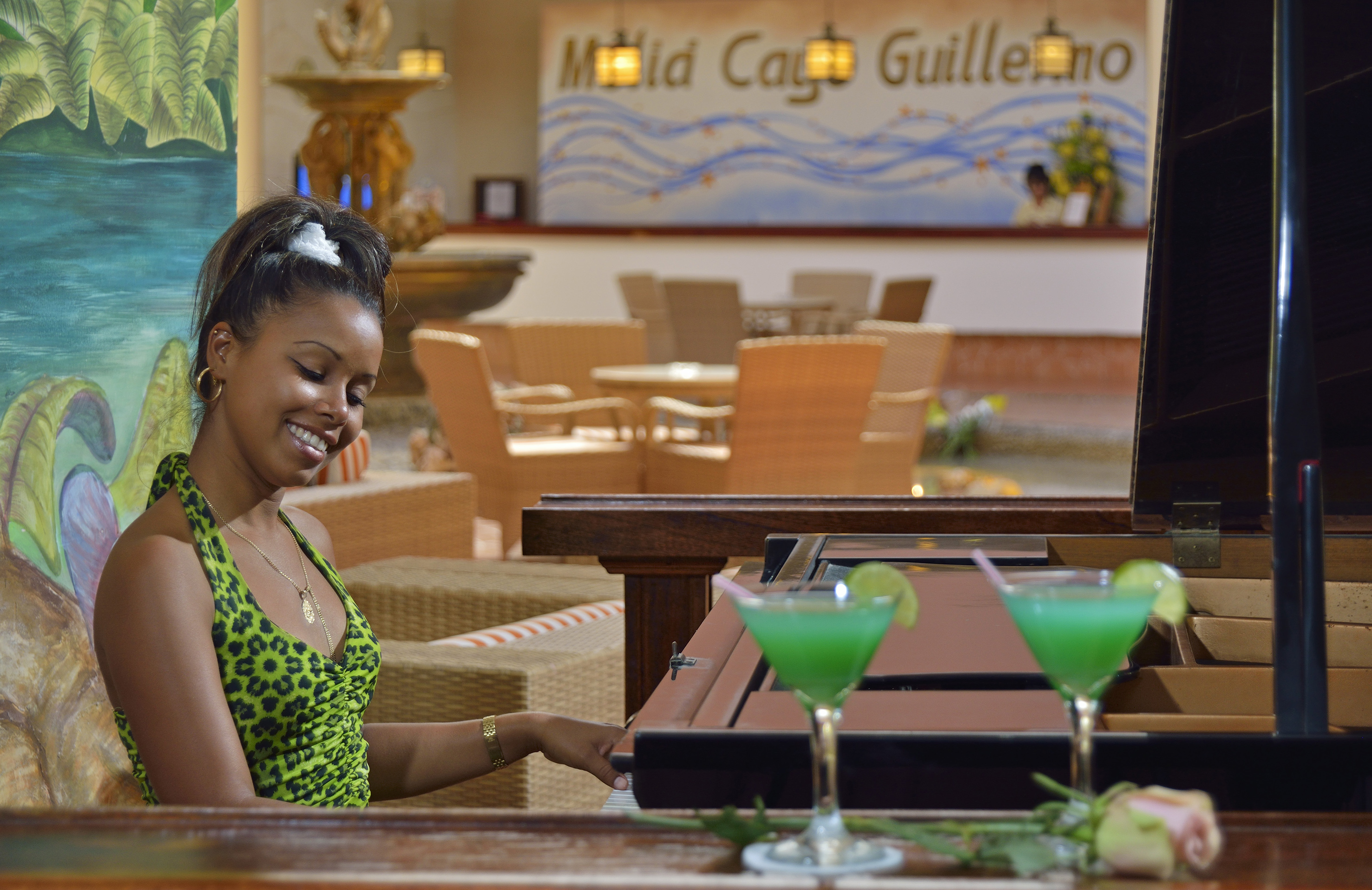 a woman playing a piano