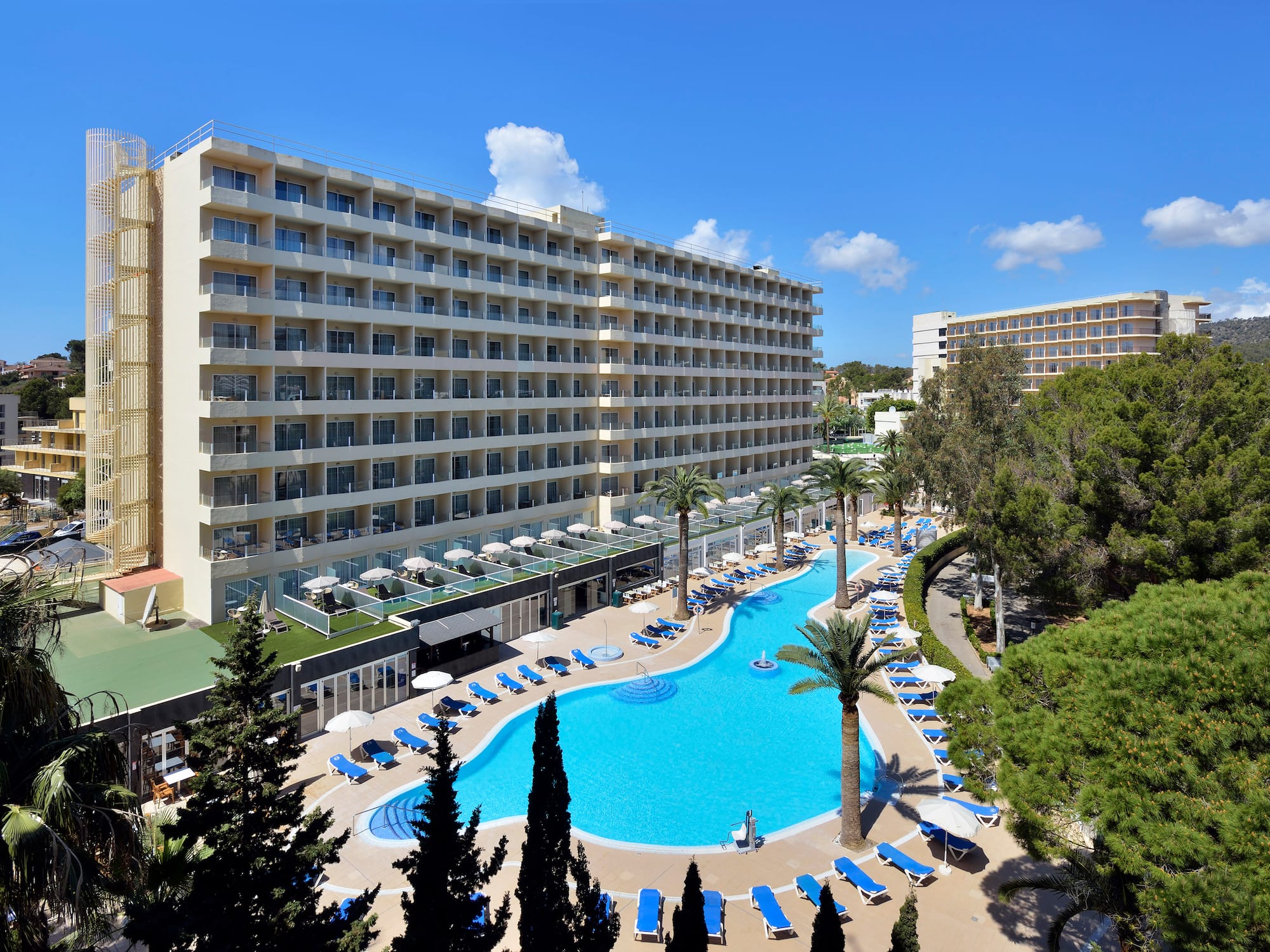 a swimming pool and a large building