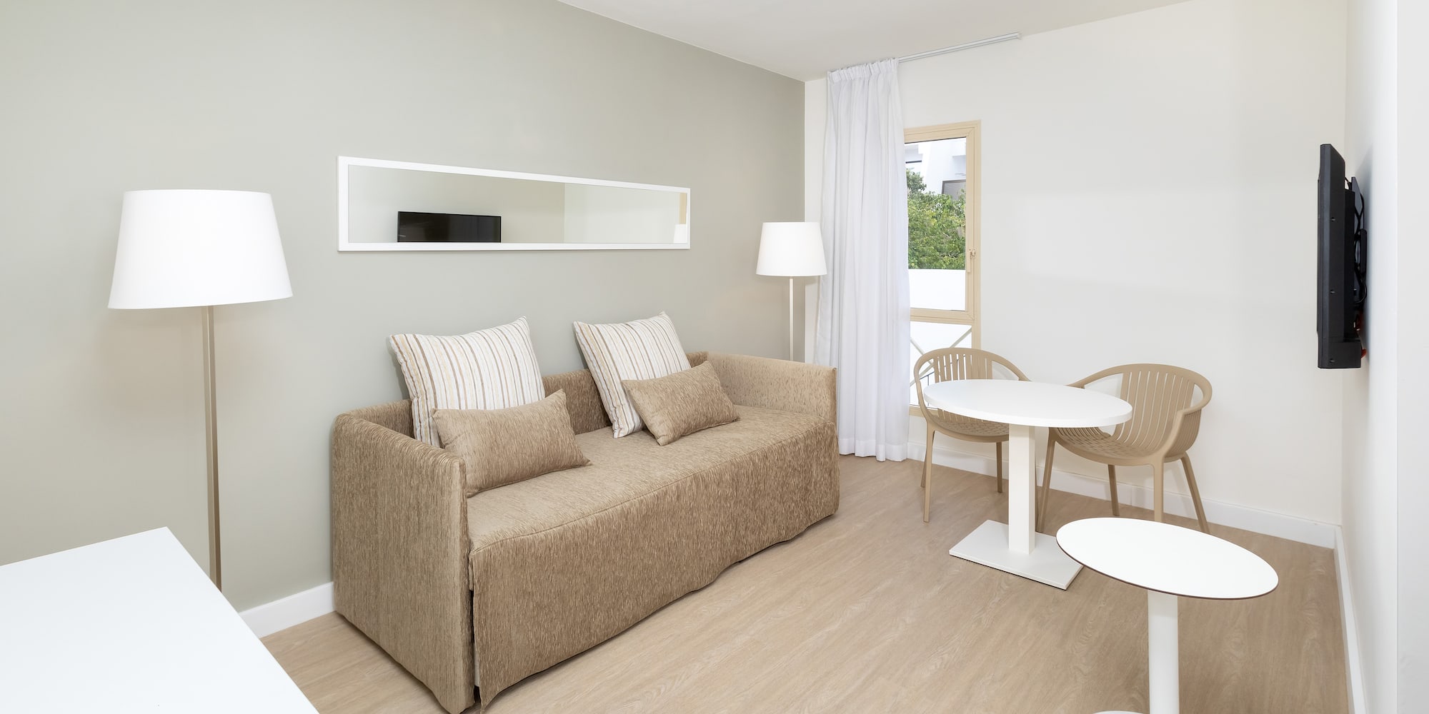 a living room with a couch and table