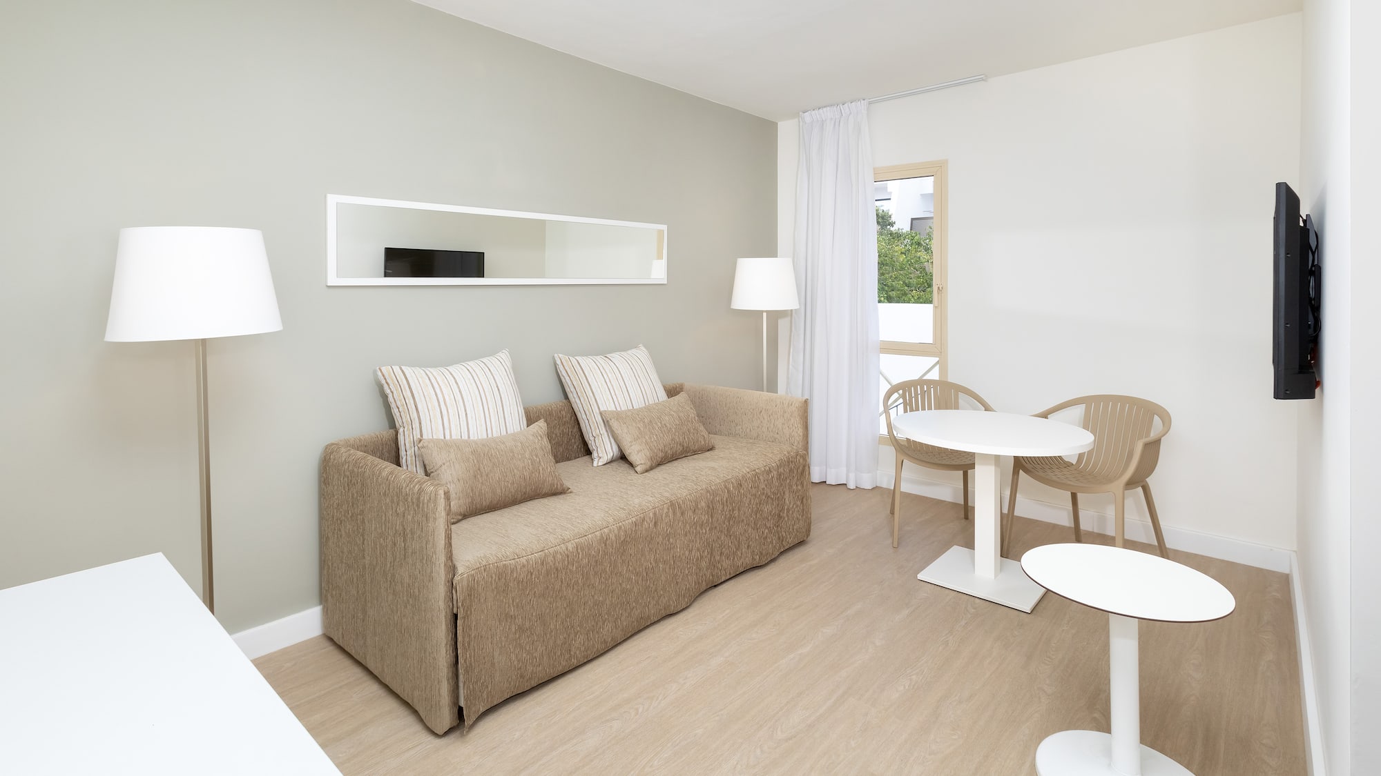 a living room with a couch and table