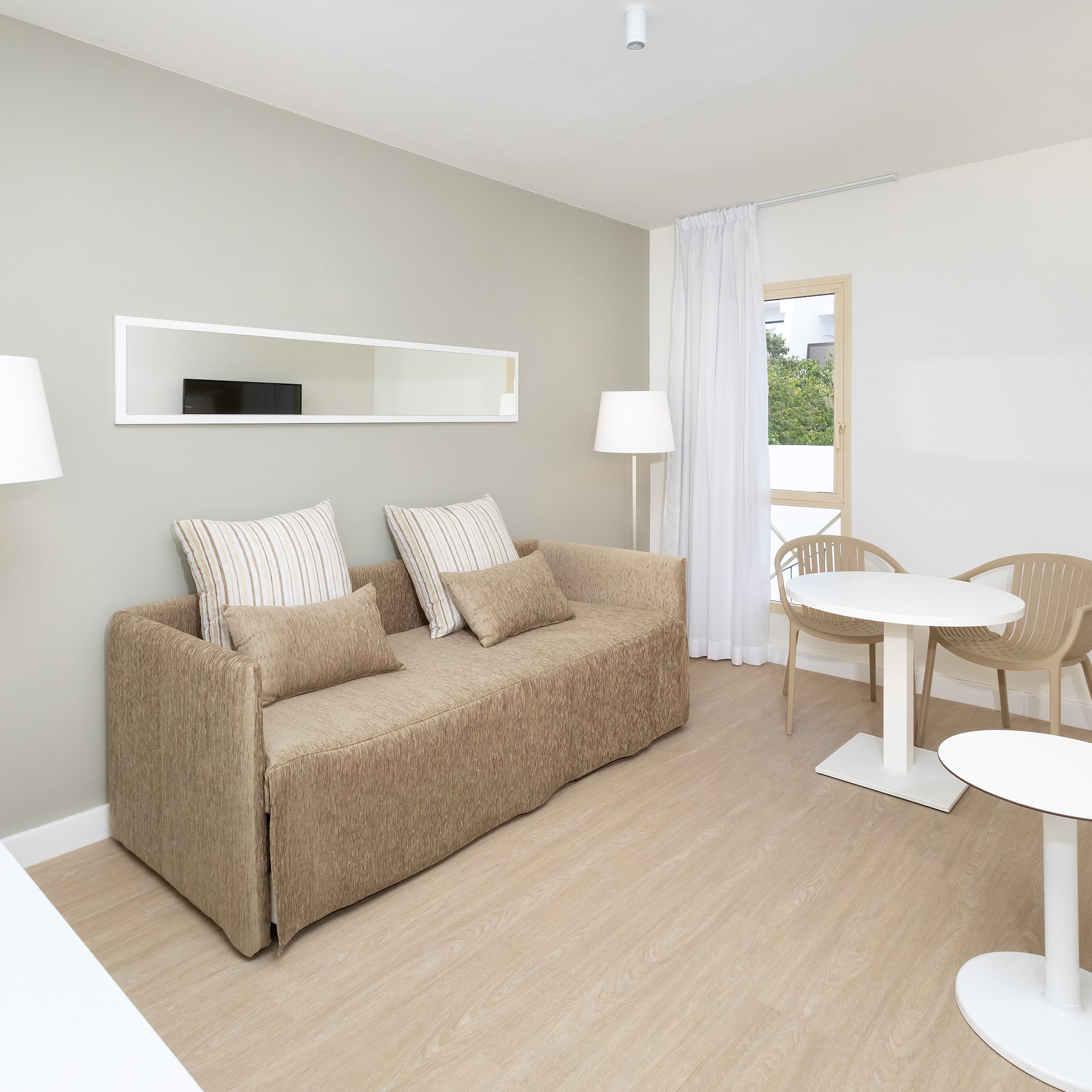 a living room with a couch and table