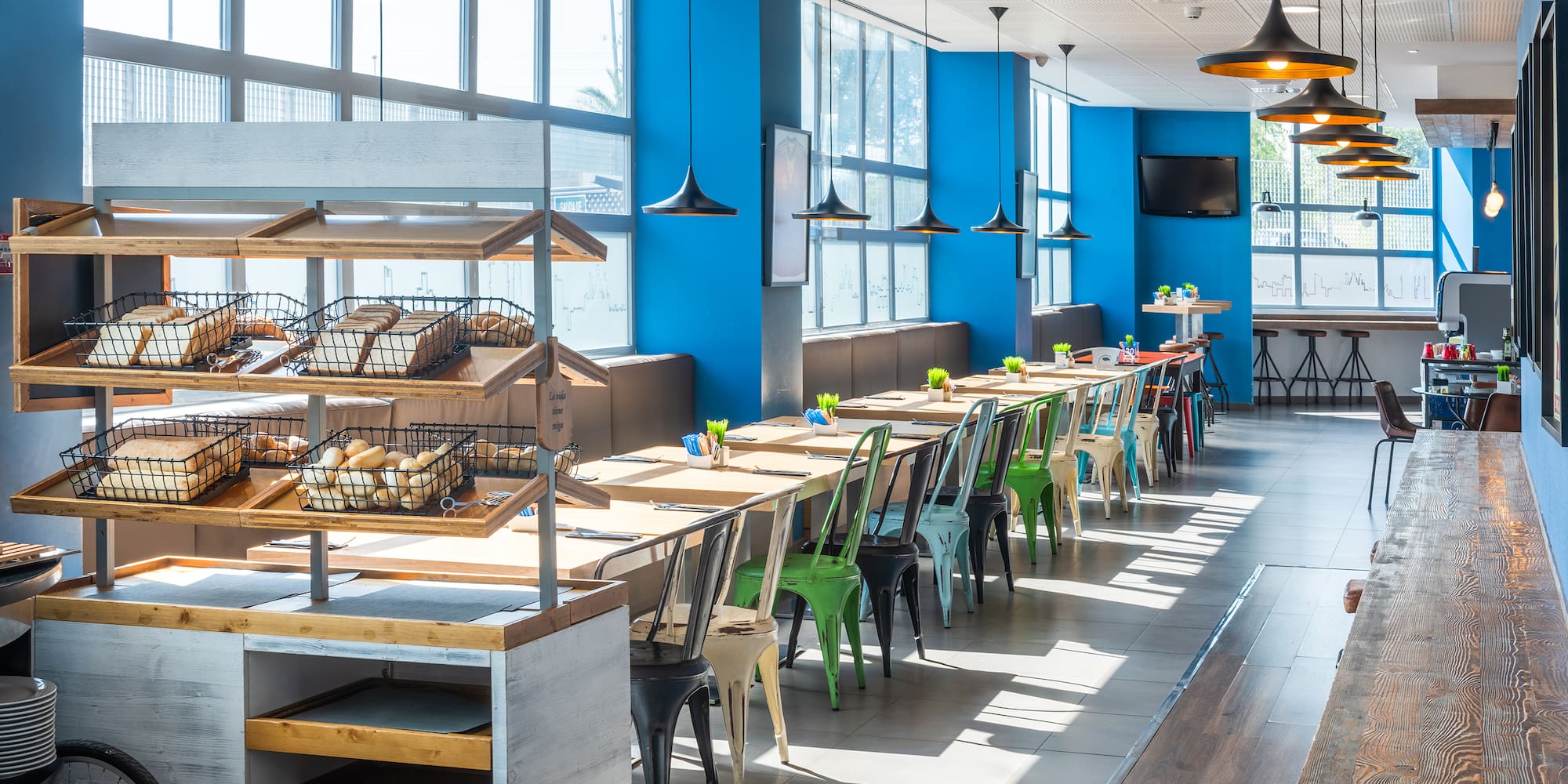 a room with tables and chairs