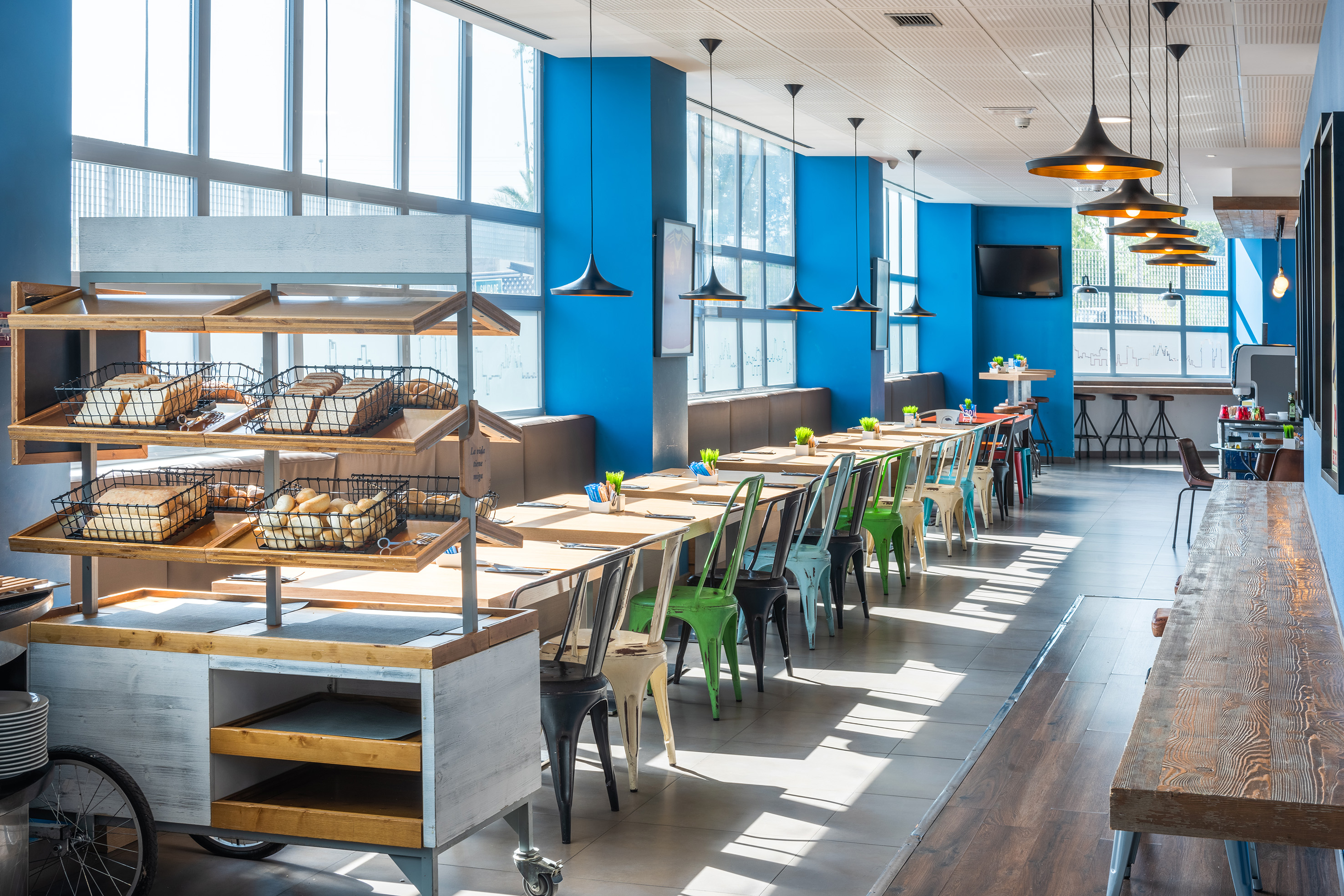 a room with tables and chairs