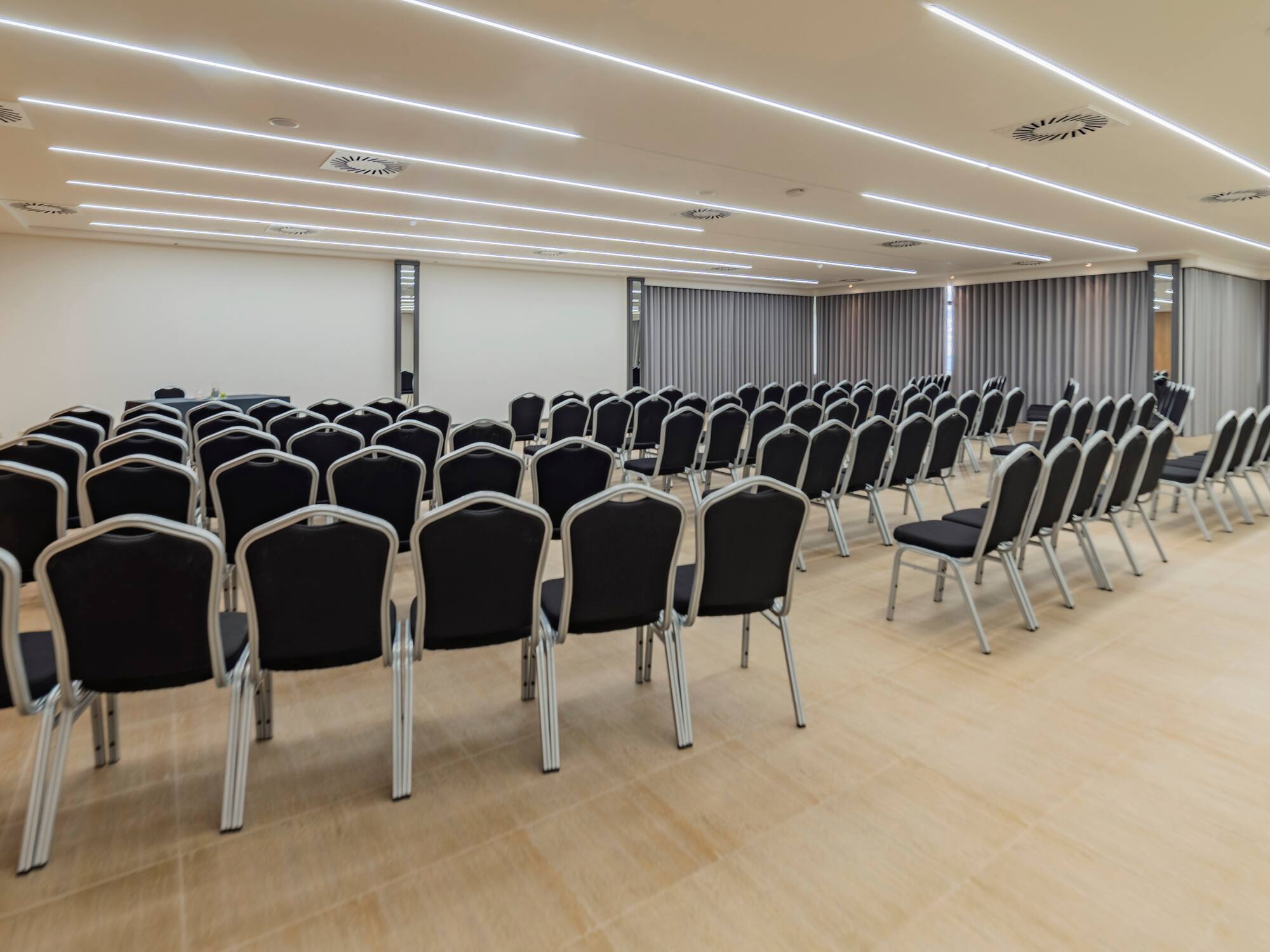 a room with rows of chairs