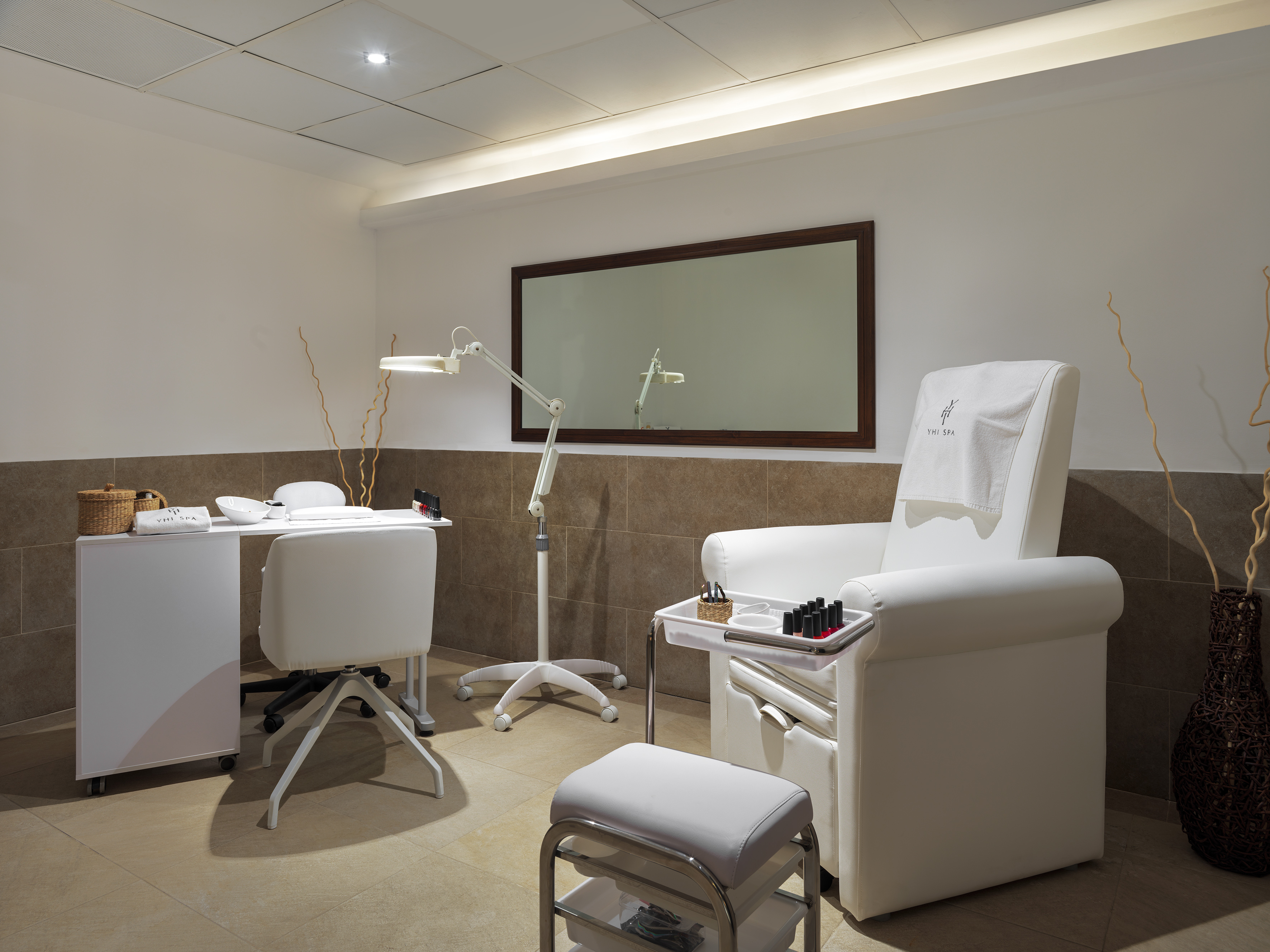 a room with a chair and a mirror