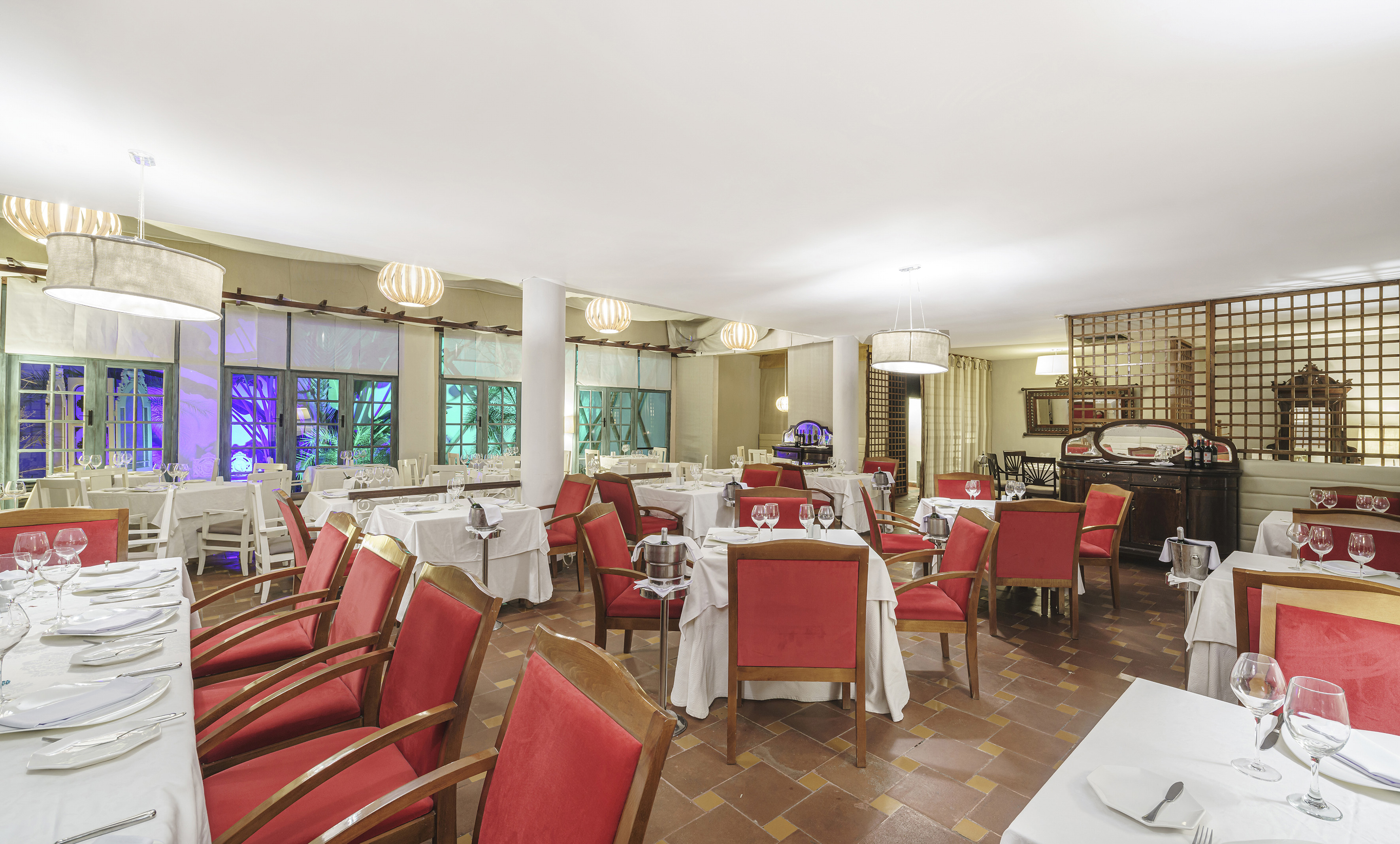 a room with tables and chairs