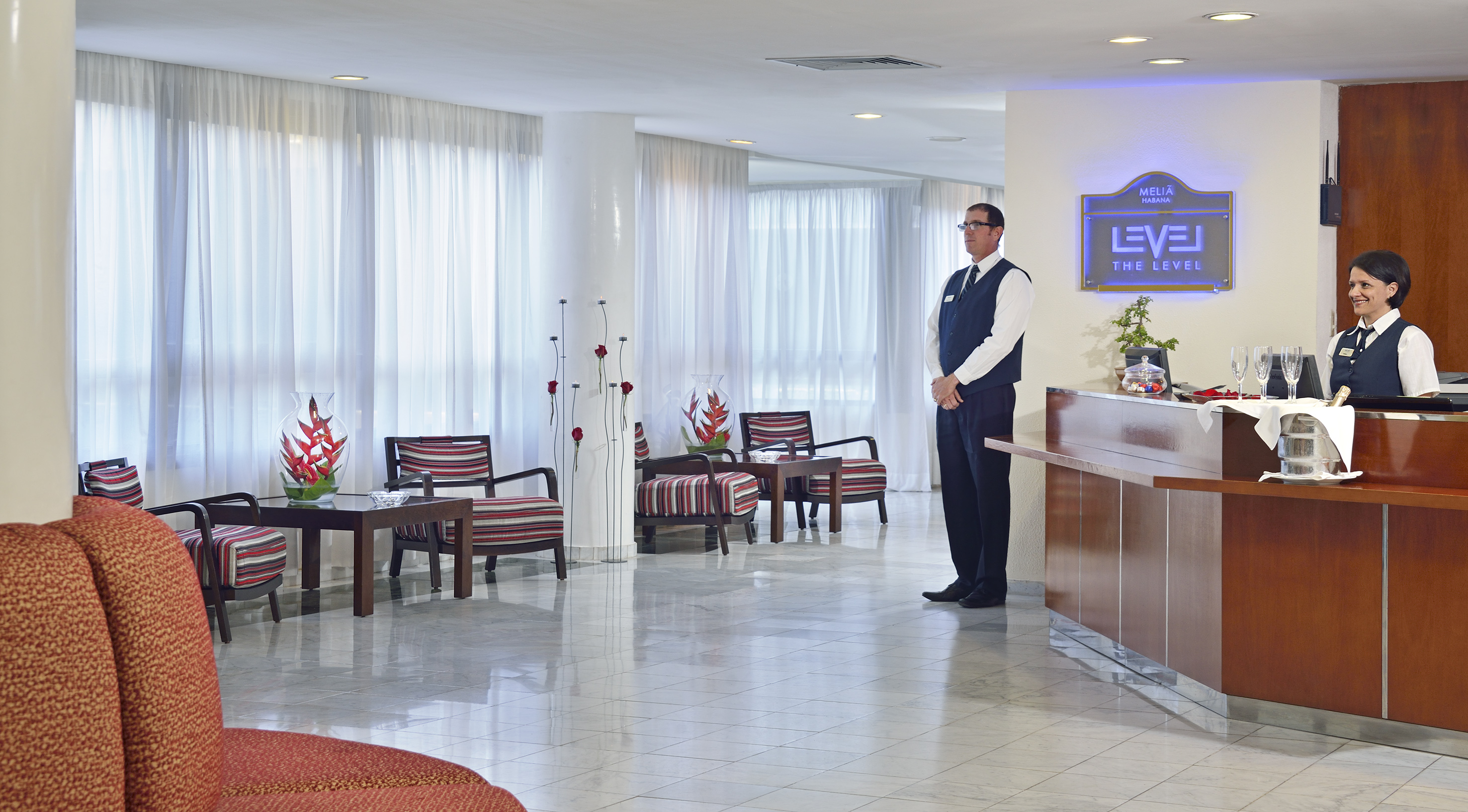 a man standing in a hotel lobby