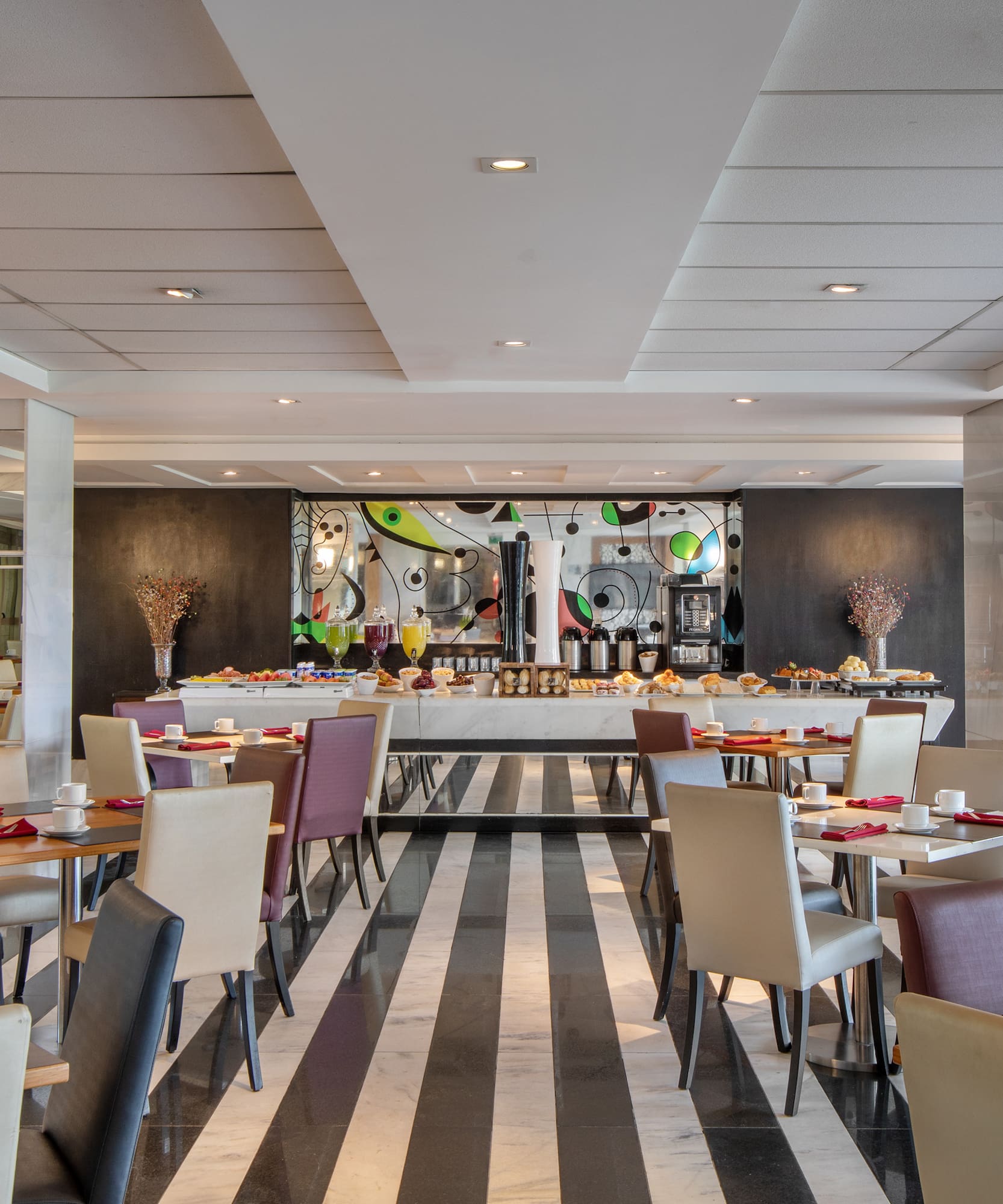 a room with tables and chairs