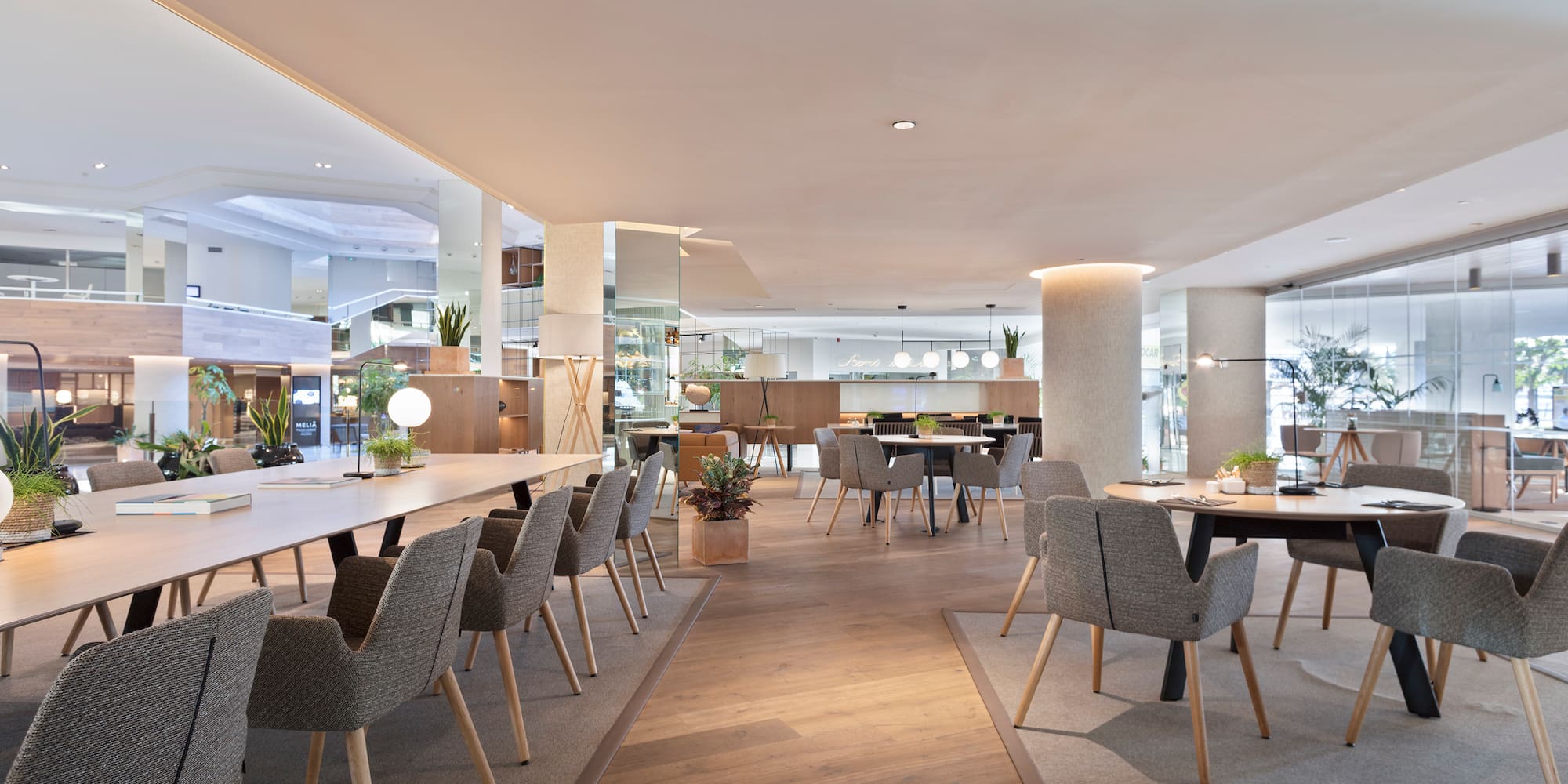 a large room with a large table and chairs