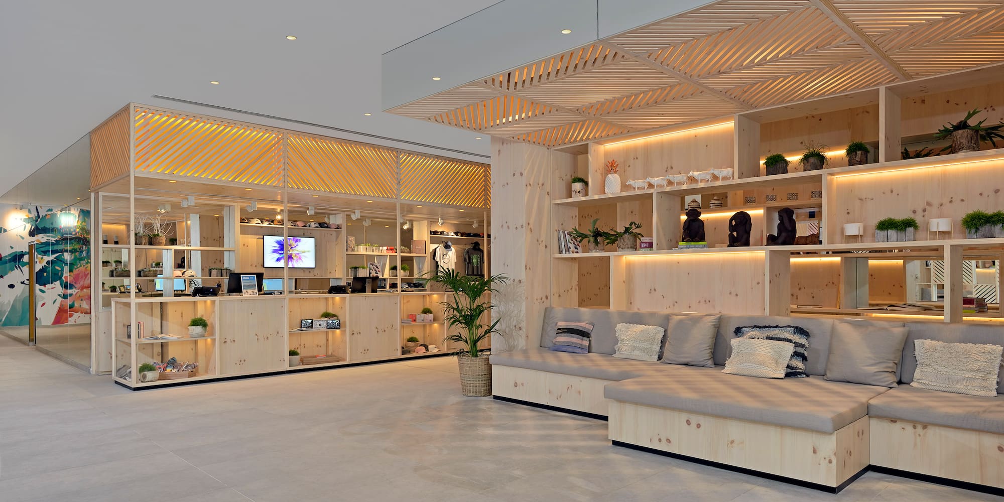 a room with a couch and shelves