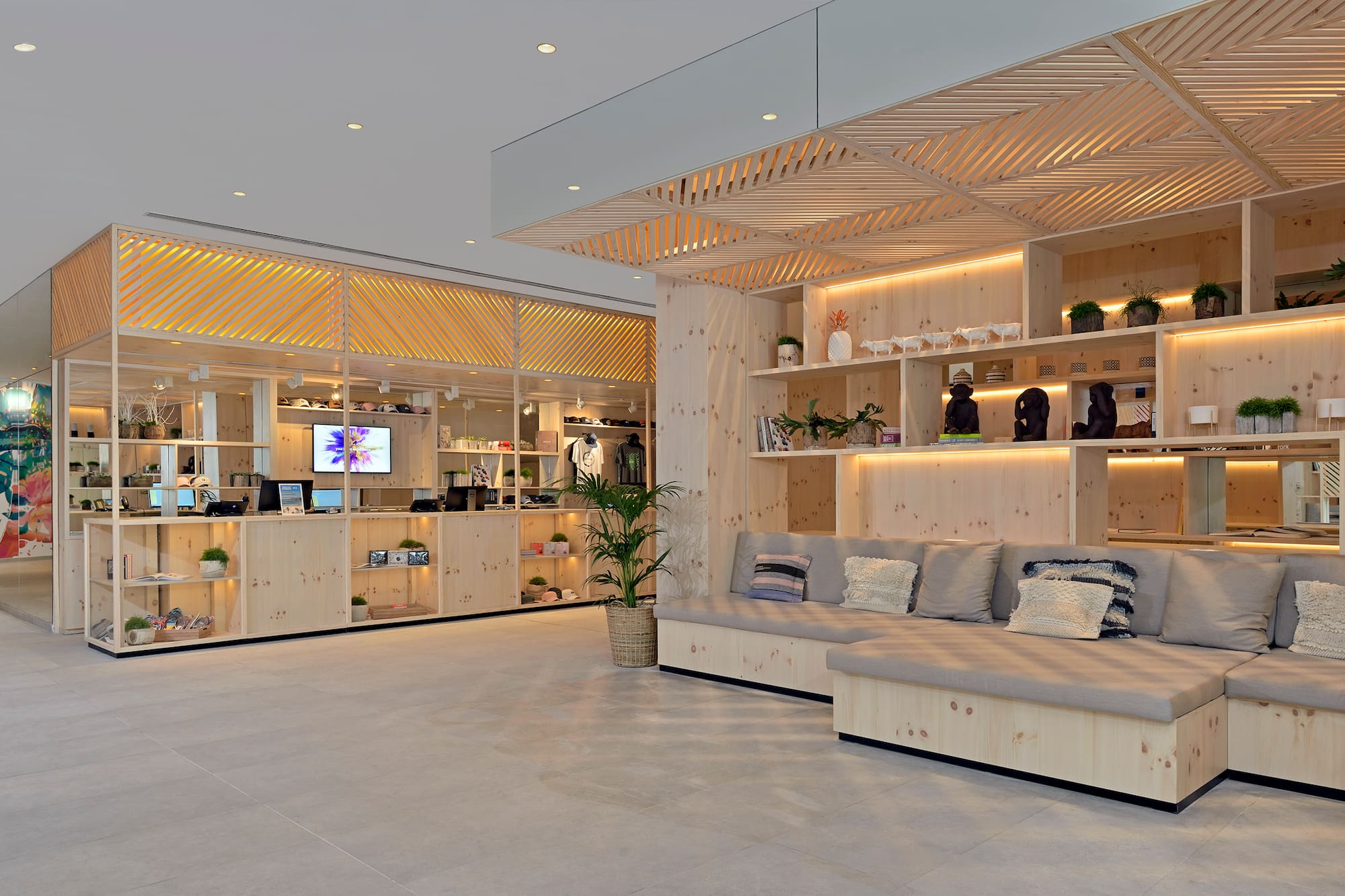 a room with a couch and shelves