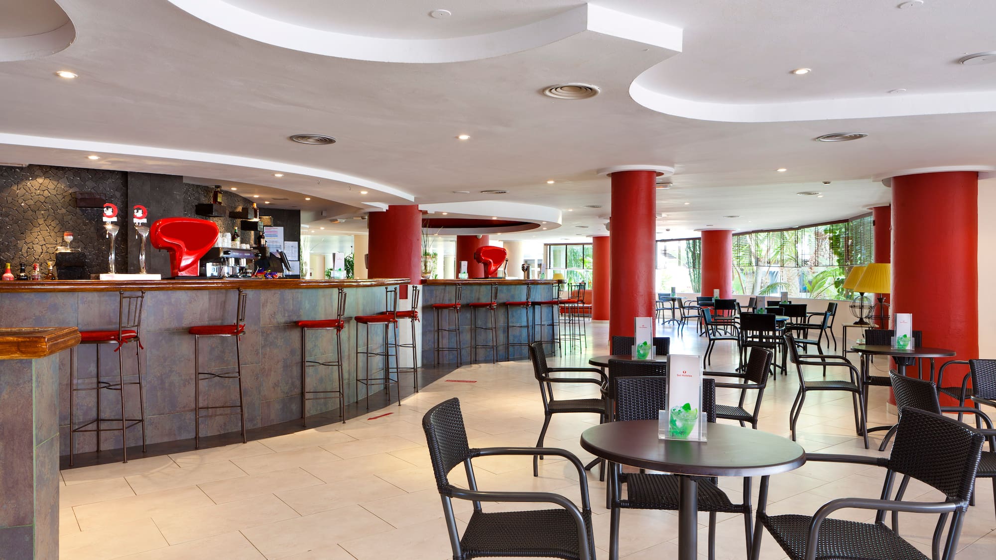 a room with tables and chairs