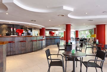 a room with tables and chairs