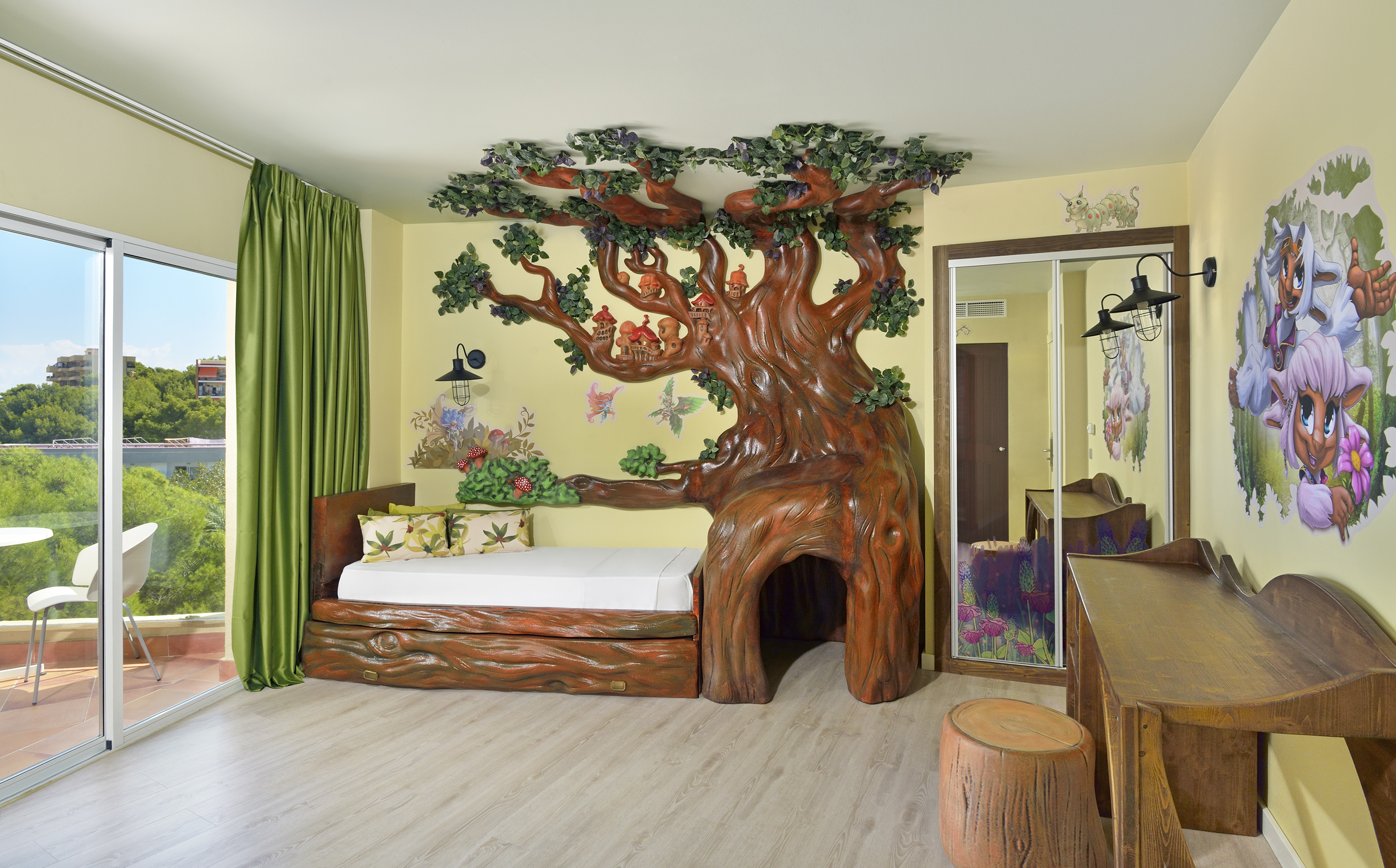 Fantasy tree bedroom for kids, with log bed, fae houses, and forest murals.