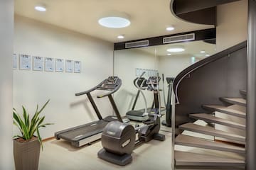 a room with treadmills and stairs