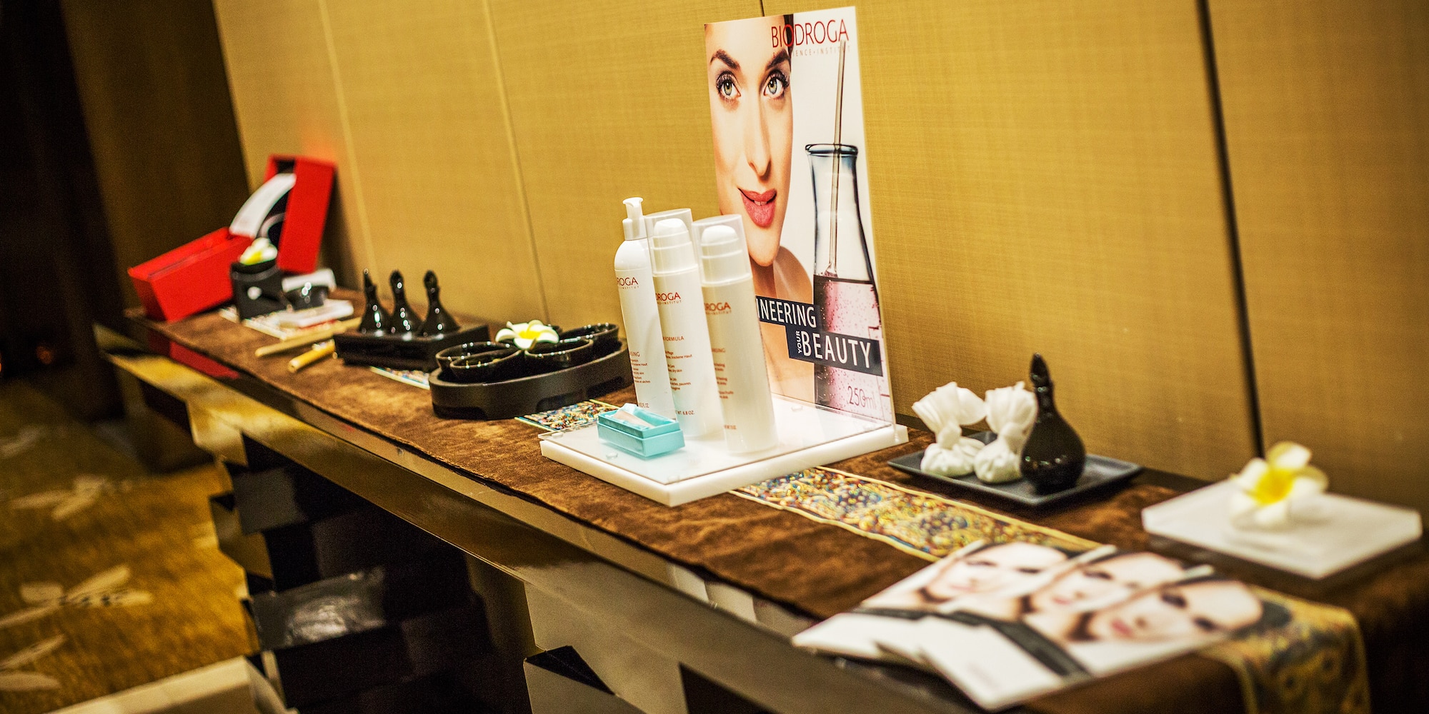 a table with a variety of cosmetics on it