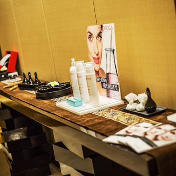 a table with a variety of cosmetics on it